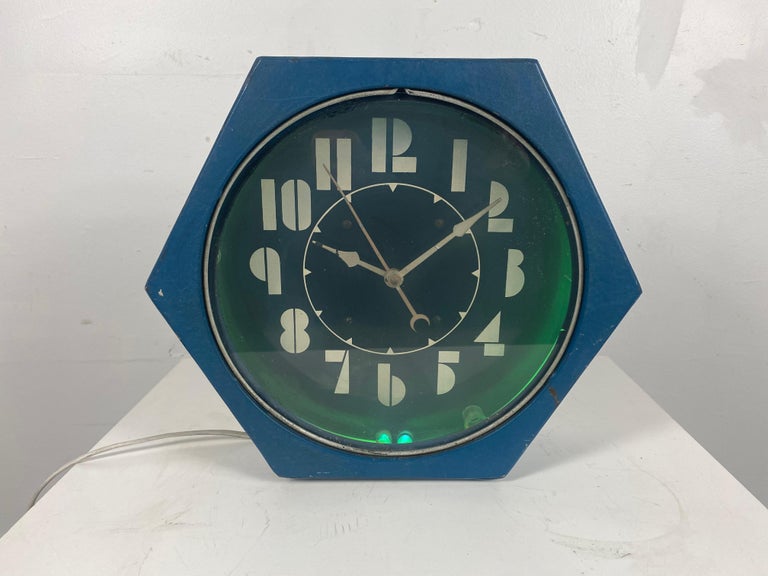 Seldom seen, small size Art Deco hexagon neon clock made by the Electric Neon Clock co., totally original. Unmolested. retains original can, clock face, green neon, motor, transformer, keeps perfect time, amazing deco font (numbers).