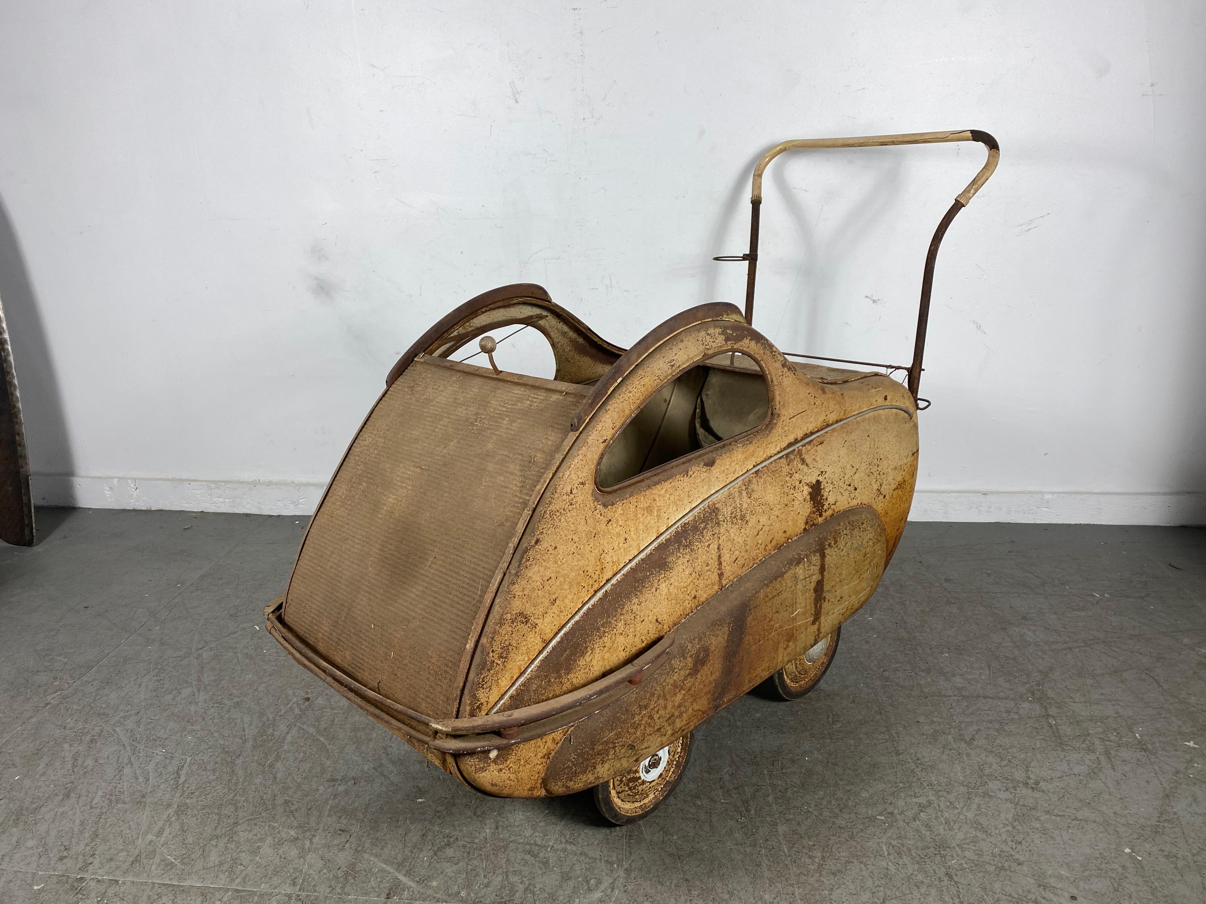 Rare 1930s Futuristic, Deco, streamline Baby Buggy / Stroller/ Perambulator PRAM... This is definitely one you wont see everyday,, Amazing design,SCULPTURE,, Retains original finish,,color,,surface ..patina..Tambour sliding panels (top) All