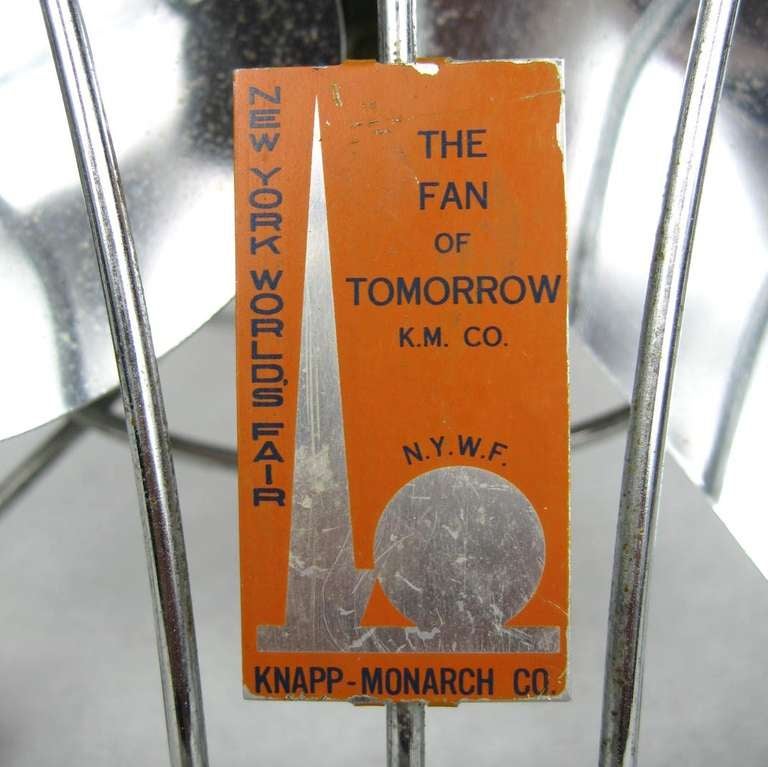 This is a very rare, extremely unusual original 1939 New York World’s Fair fan. There is a plaque mounted on the front cage that says New York Worlds Fair. Knapp-Monarch Co. “The Fan of Tomorrow” in orange and blue, along with the “Trylone and
