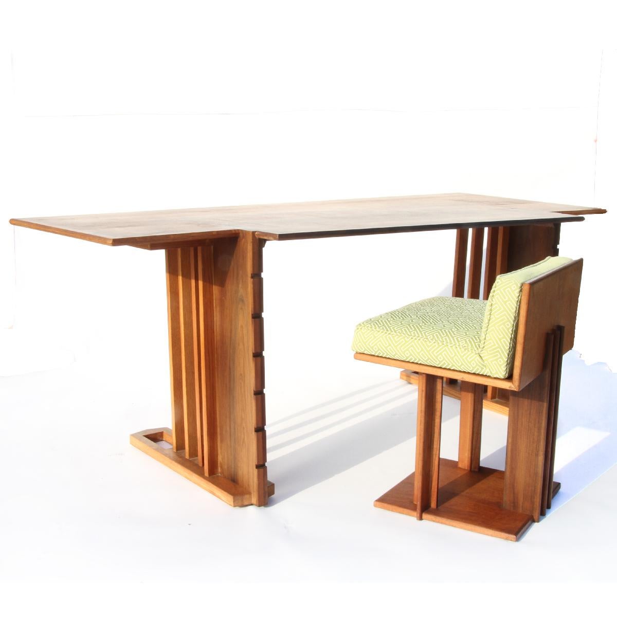 Very rare Unison desk and chair by Frank Lloyd Wright designed for the second owners of The Derby House in 1947. Desk is comprised of various woods, cherry, oak and walnut.  