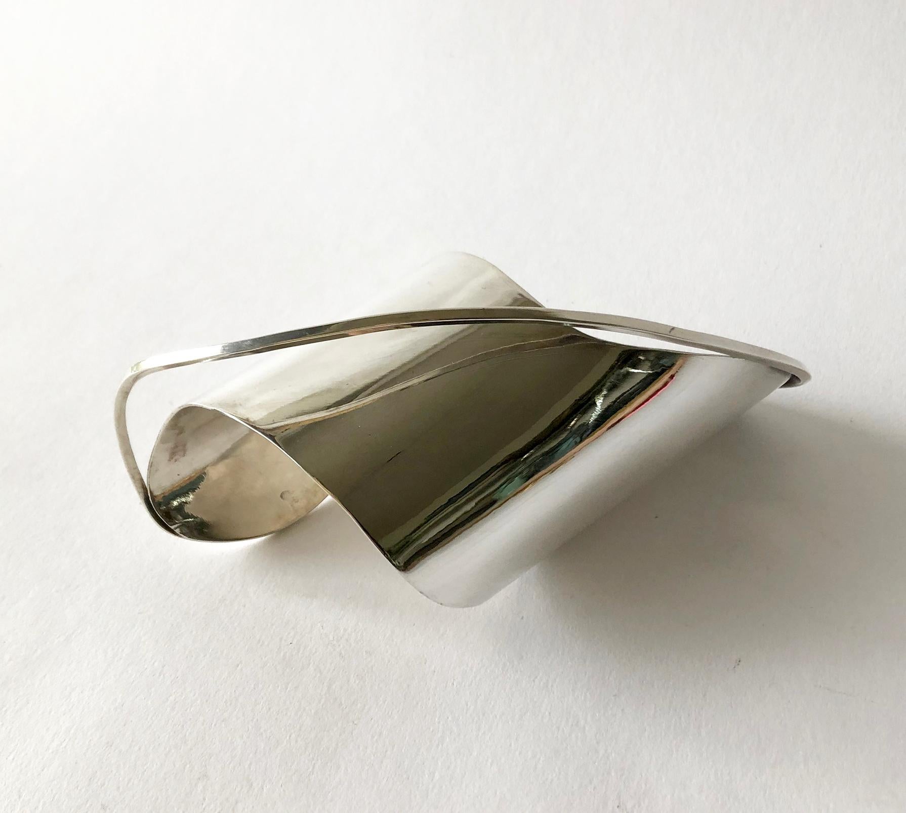 Sterling silver early modernist cuff bracelet created by Ed Wiener of New York City, New York, circa 1948.  Cuff is the largest of this design measuring 5.5