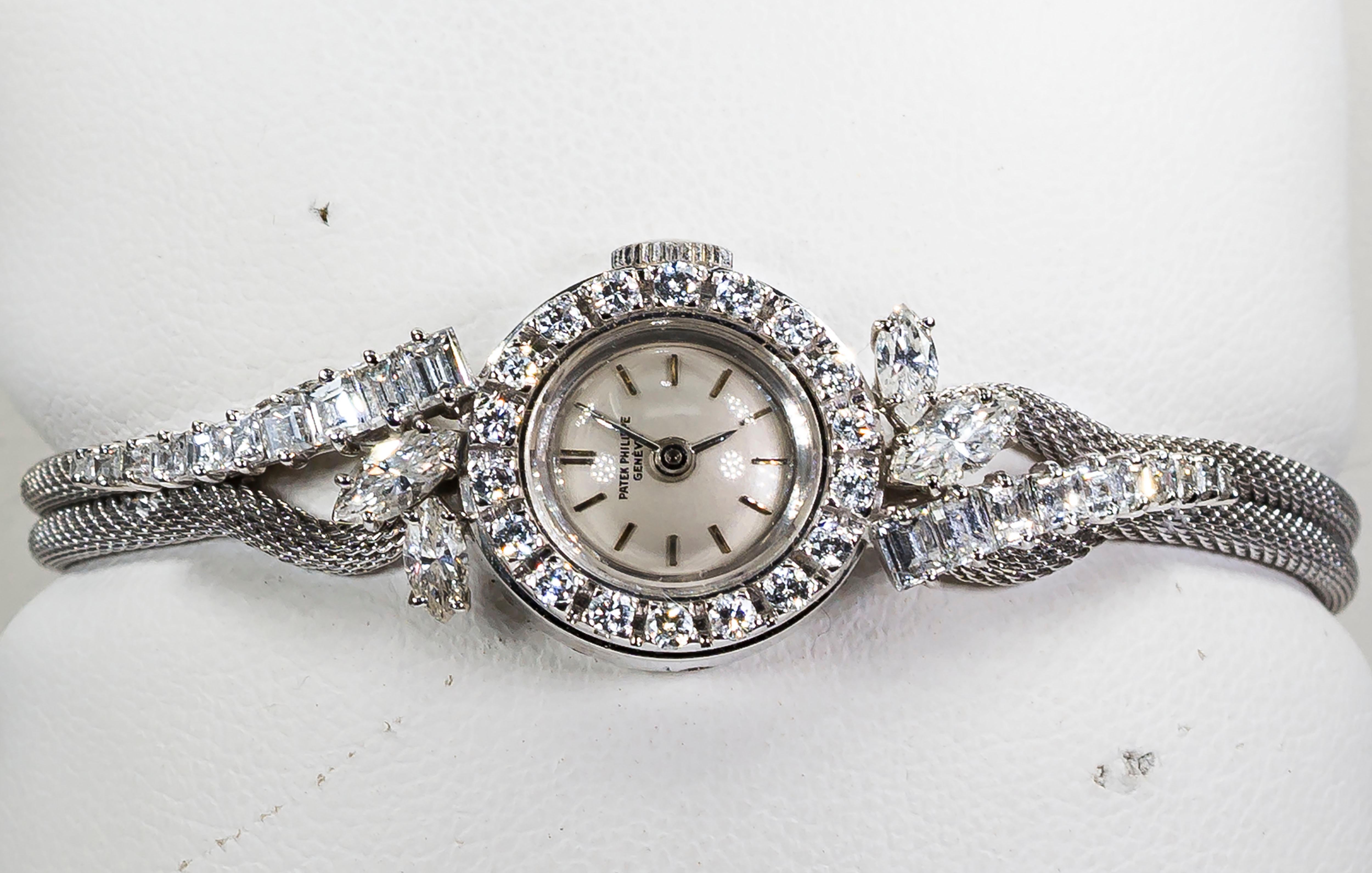Women's or Men's 1950s-1960s Patek Philippe Platinum Triple Diamond Twist Motif Bracelet Watch