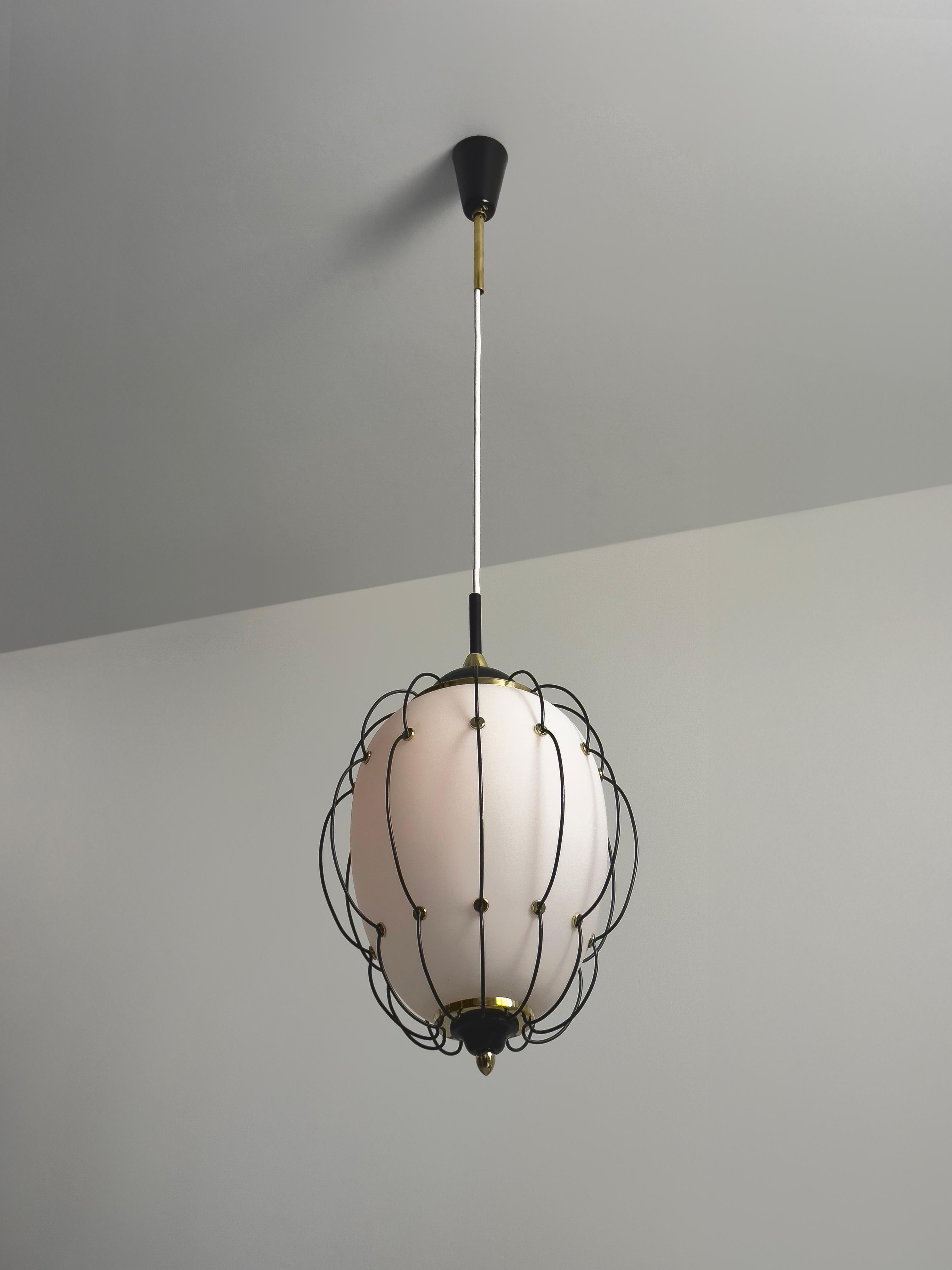 Step into the refined world of mid-century Italian design with this ceiling lamp from the 1950s/60s. Its structure is composed of elegantly curved black-painted metal wire, forming two sweeping lines that create a striking visual rhythm. A set of
