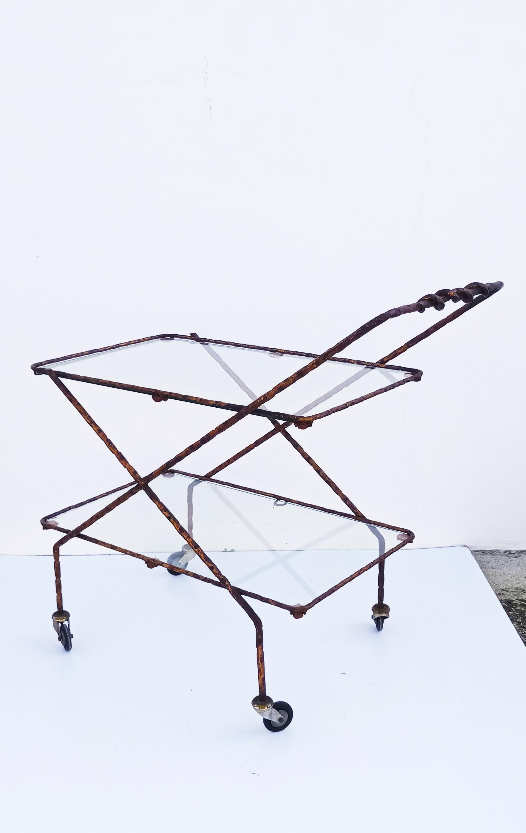 Beautiful and rare Brutalist iron bar cart manufactured in 1950s. In very good vintage condition.
