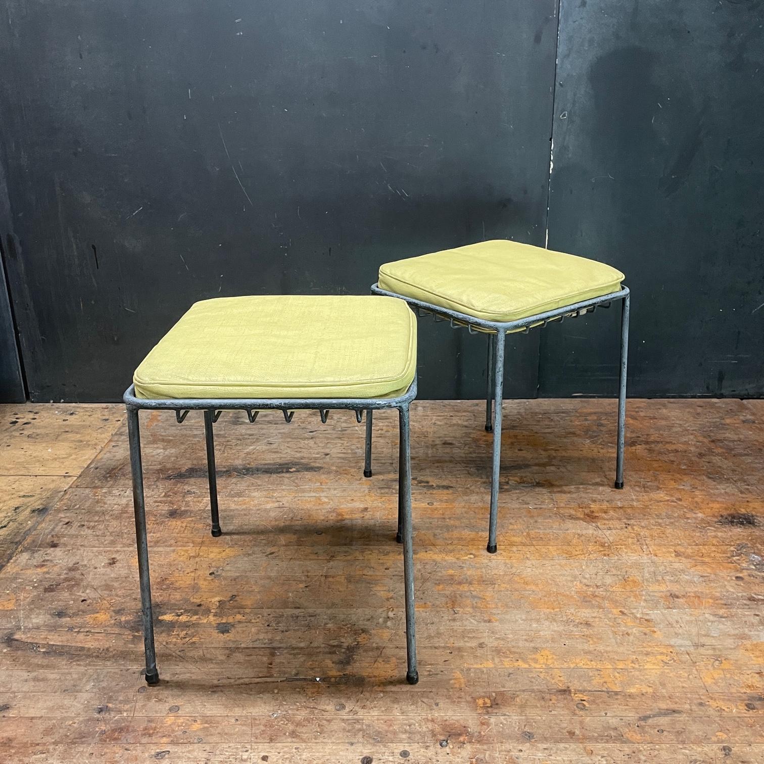 Extremely rare pair of Arbuck Inc. square grid stools, with original labeled cushions. Could source glass tops to make tables, but no glass is included in this sale.  Sold as a pair of stools. 
 these were only produced in 1951.  We, also have a