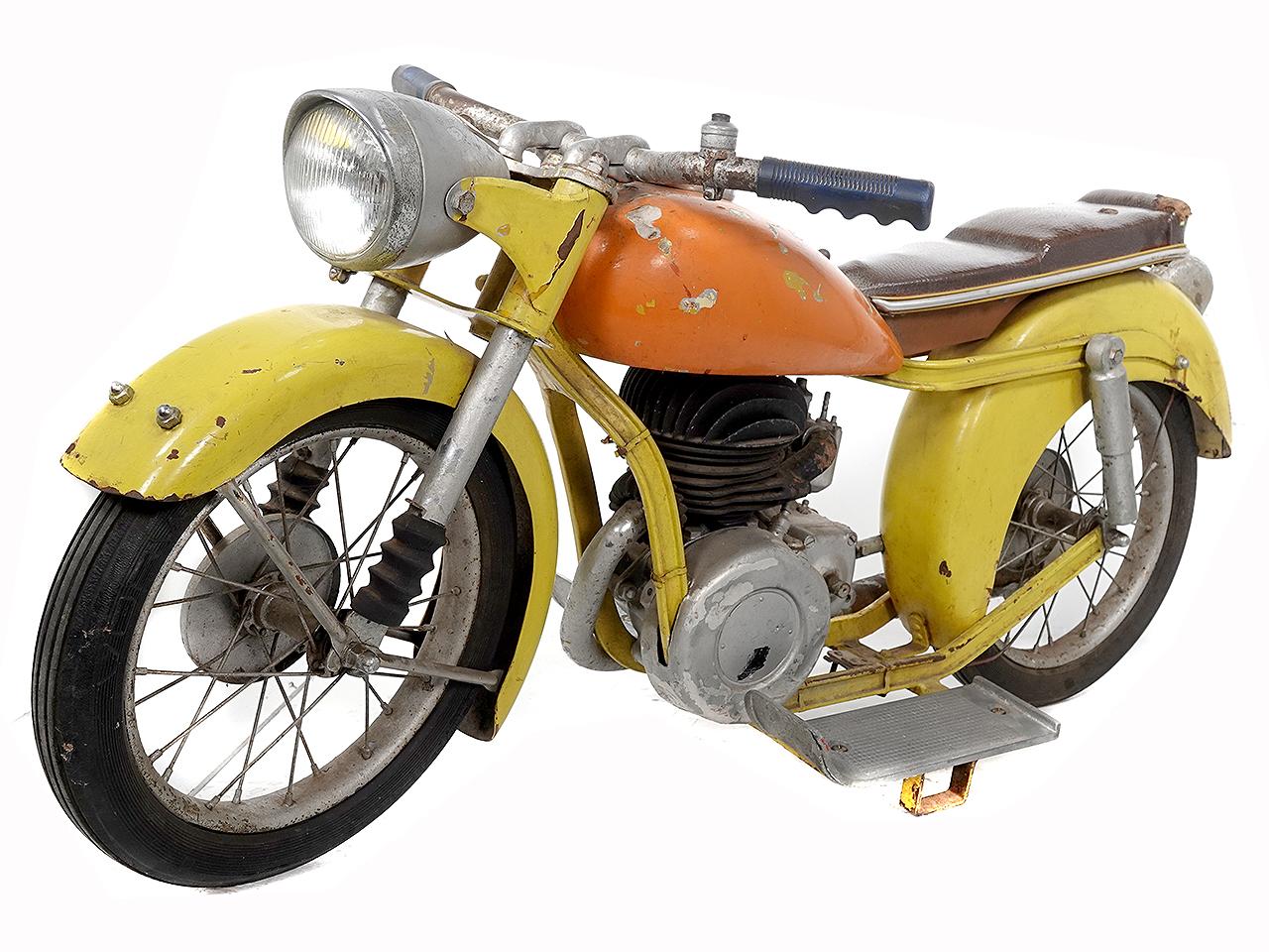 This item is a lot smaller than it looks in the pictures. The handlebars are less that 2 foot tall. Its sized for a small child but has the proportions of a full size motorcycle. Thats what I like best about it. Its a 1950s Small Horex Motorcycle