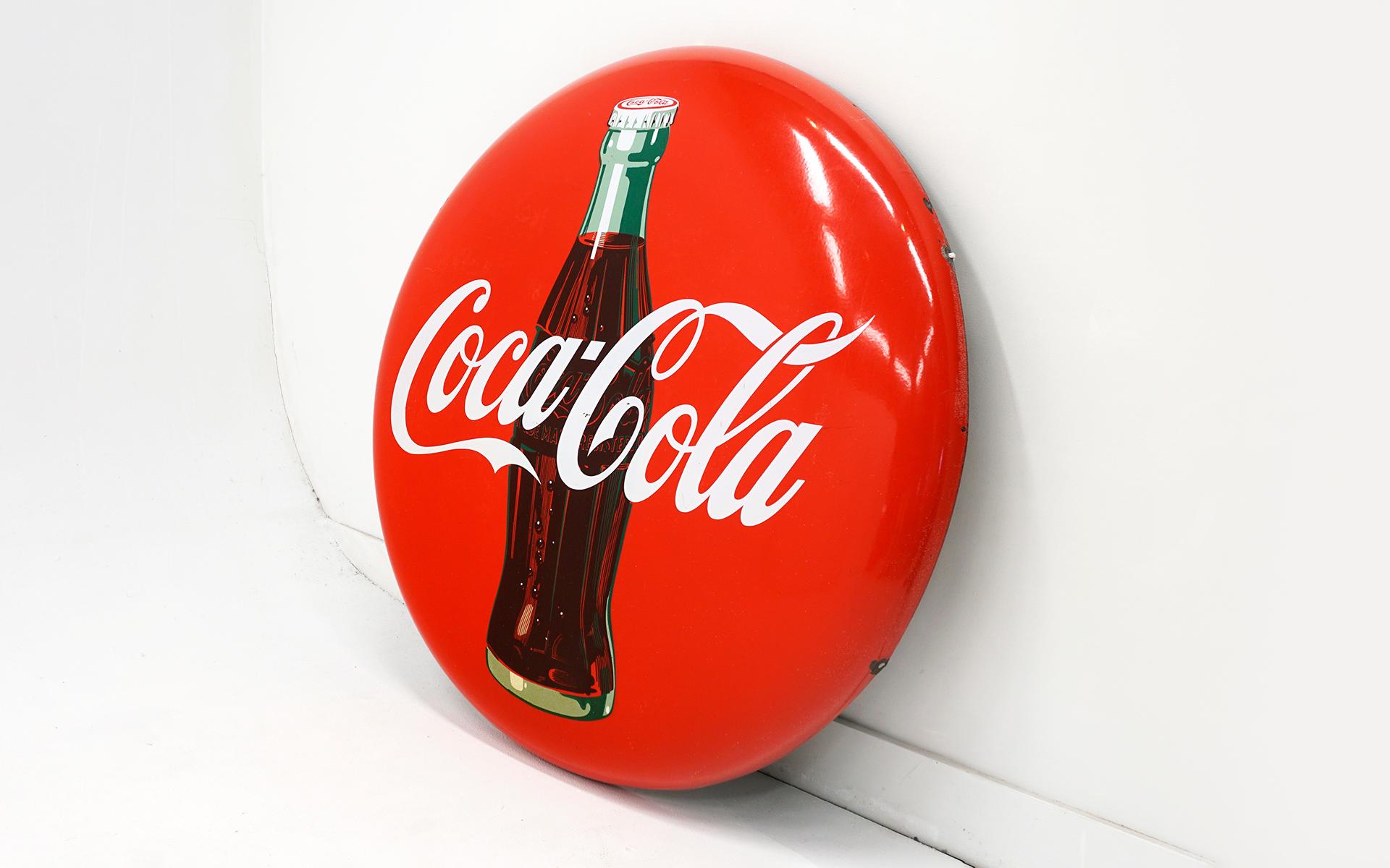 Rare 1950's Coca Cola Button Sign, 48 inches in diameter. Painted metal. Very good condition with few signs of wear around edges as seen in the photos. Ready to display.
