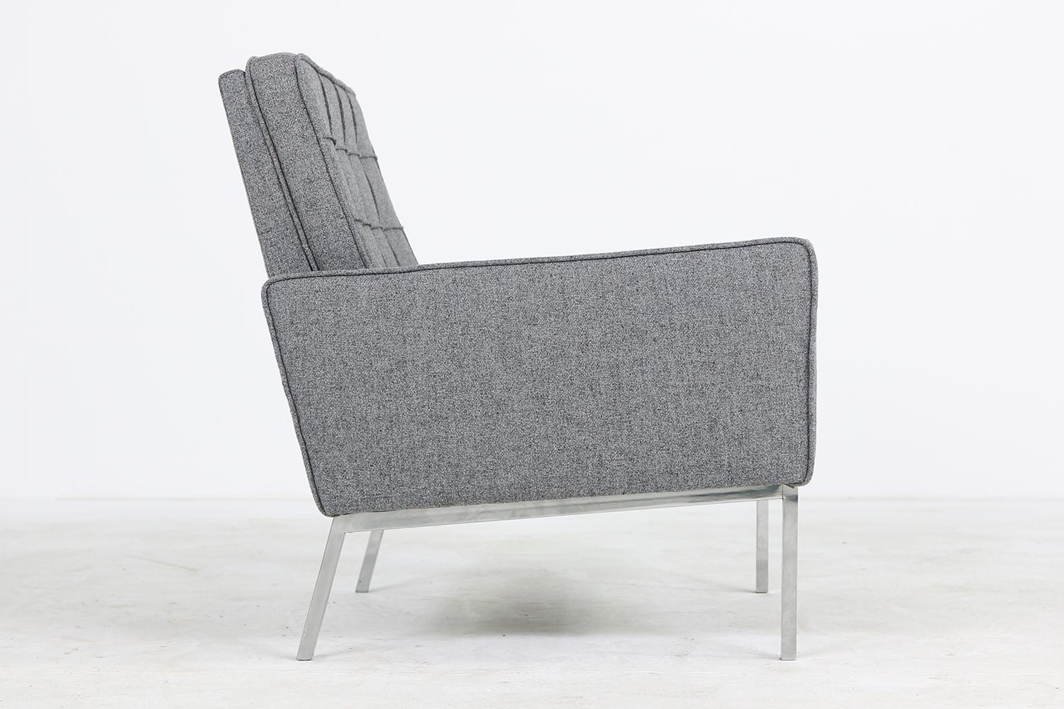 Beautiful,large and restored 1950s Florence Knoll Mod. 65a armchair, reupholstered and covered with new grey woven fabric, very good condition. Made by Knoll International.