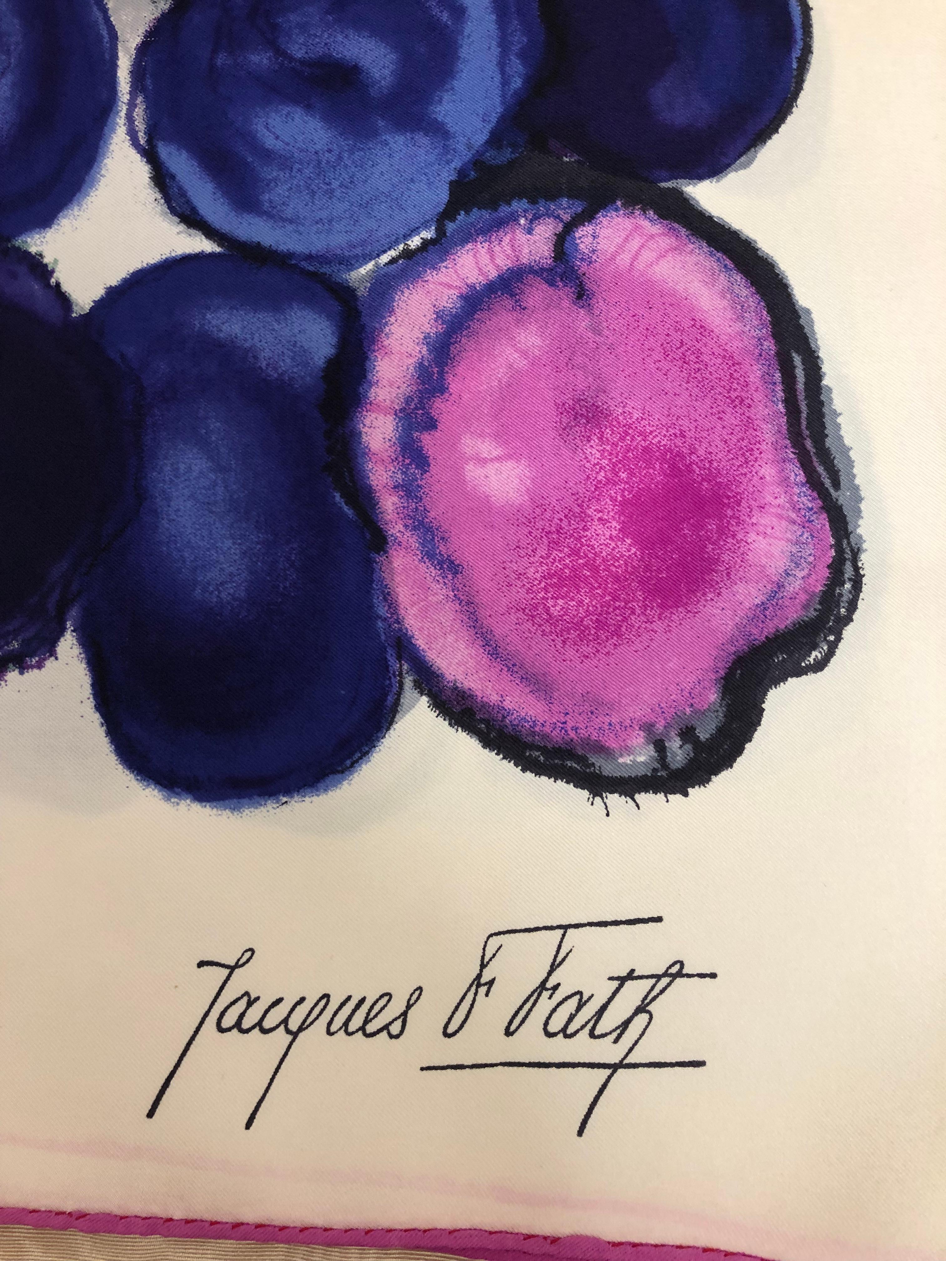 Beautifully vibrant scarf which looks hand painted. Hues of predominantly blues, pinks and purples with splashes of green, this silk scarf with hand rolled hems would look equally good hanging on your wall.

It is signed Jacques F Fath and still has