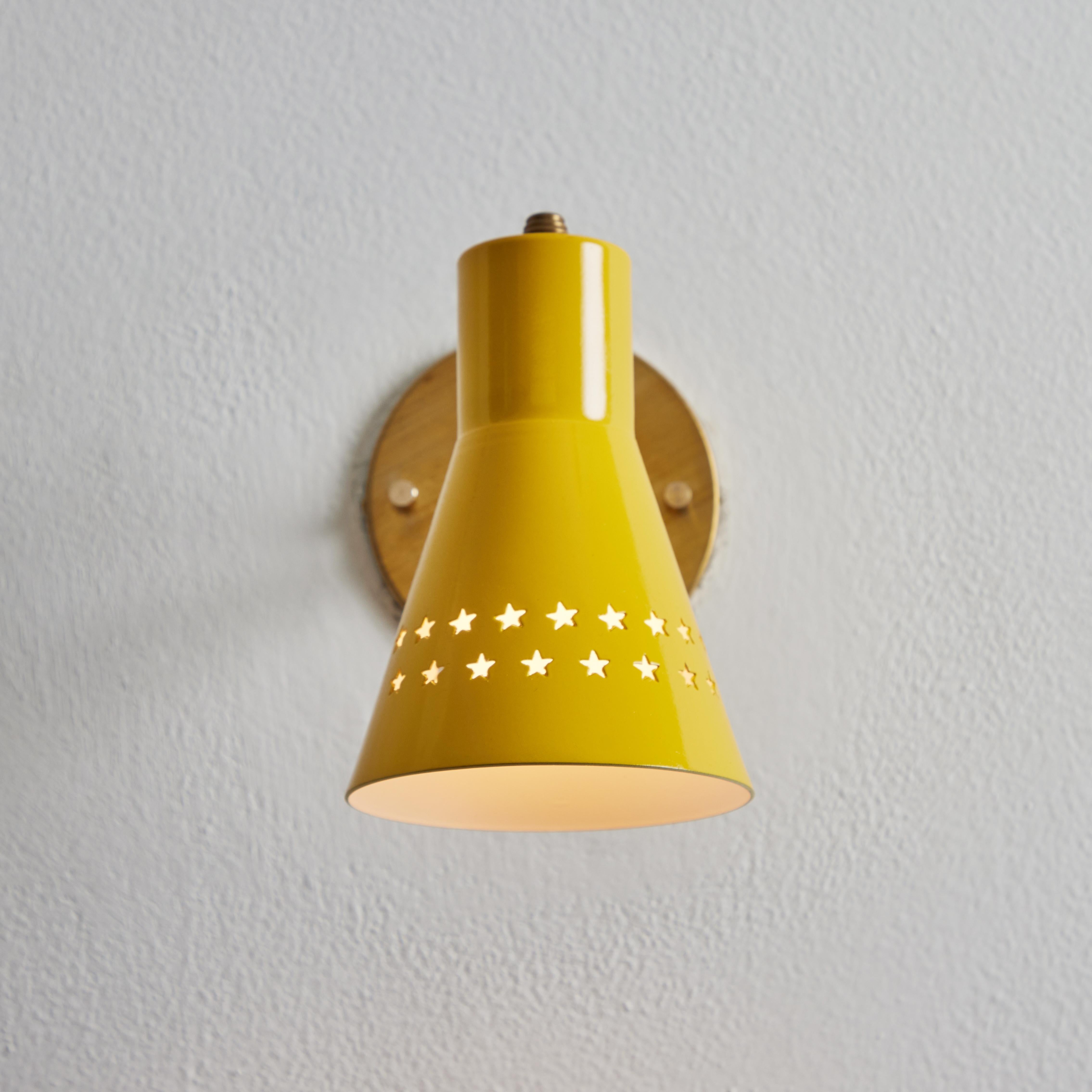 Rare 1950s Robert Mathieu Perforated Yellow Metal and Brass Wall Sconce In Good Condition For Sale In Glendale, CA