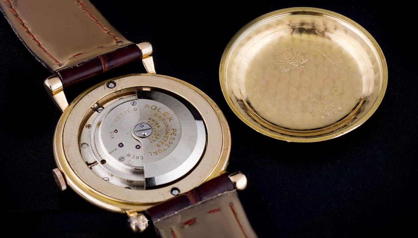 Rare chronomètre champagne Rolex en or rose des années 1950, précision du cadran, modèle Vintage 4134 en vente 1