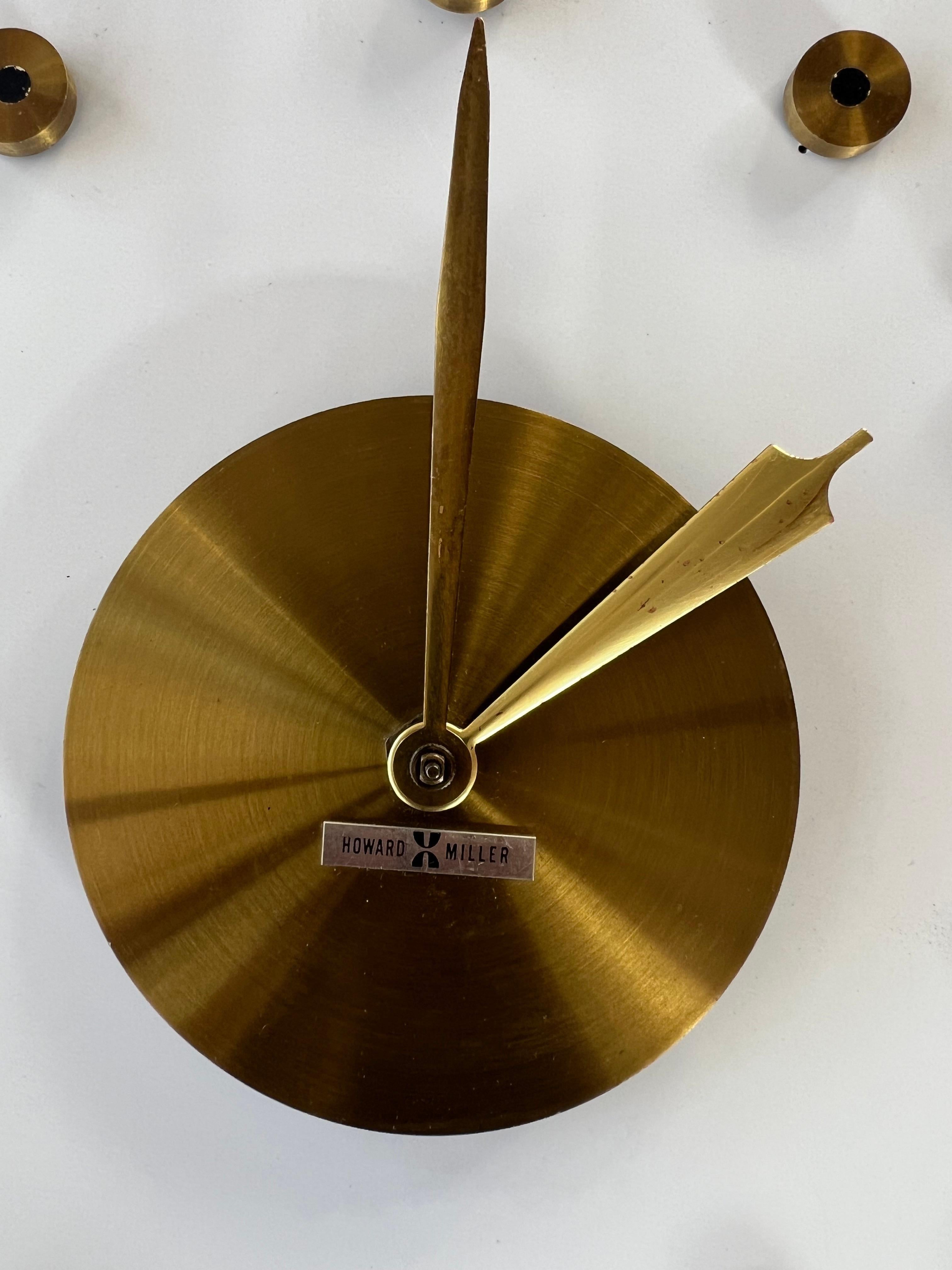 Rare 1950’s Howard Miller built in wall clock design by George Nelson. 
Designed to be direct wire and the hours are pushed into drywall like tacks. 
Retain the Howard Miller label on the front face and on the back. 

In original vintage condition,