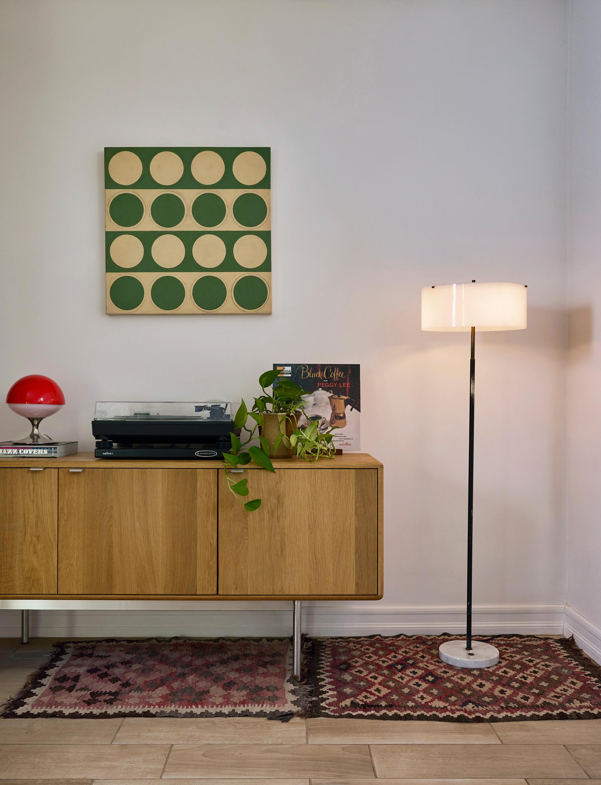 Rare 1950s Stilux Milano Floor Lamp in the Manner of Tito Agnoli

Executed in opaline perspex shade with painted metal stem, brass hardware, and white marble base. Minimalist and geometric, this floor lamp is highly reminiscent of the works of Tito