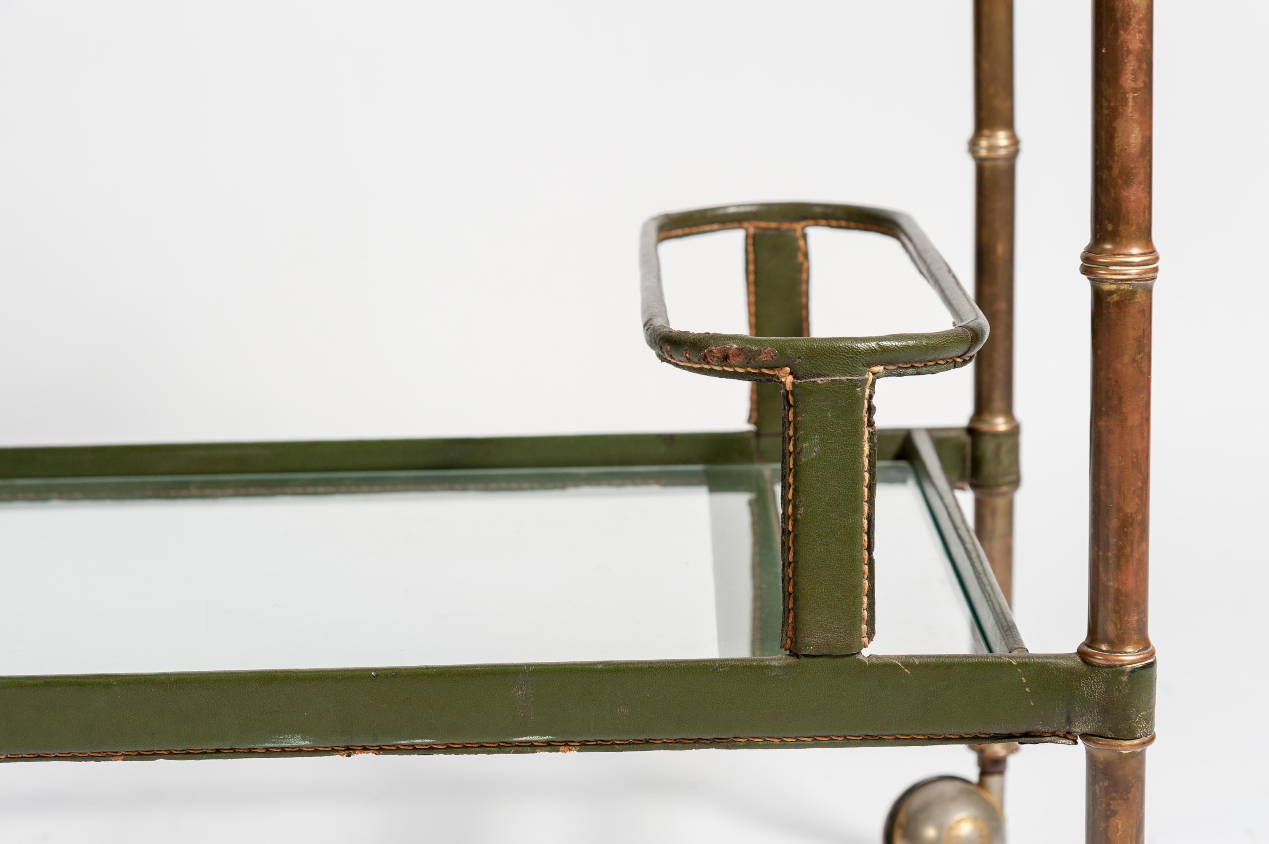Green leather bar cart by Jacques Adnet.