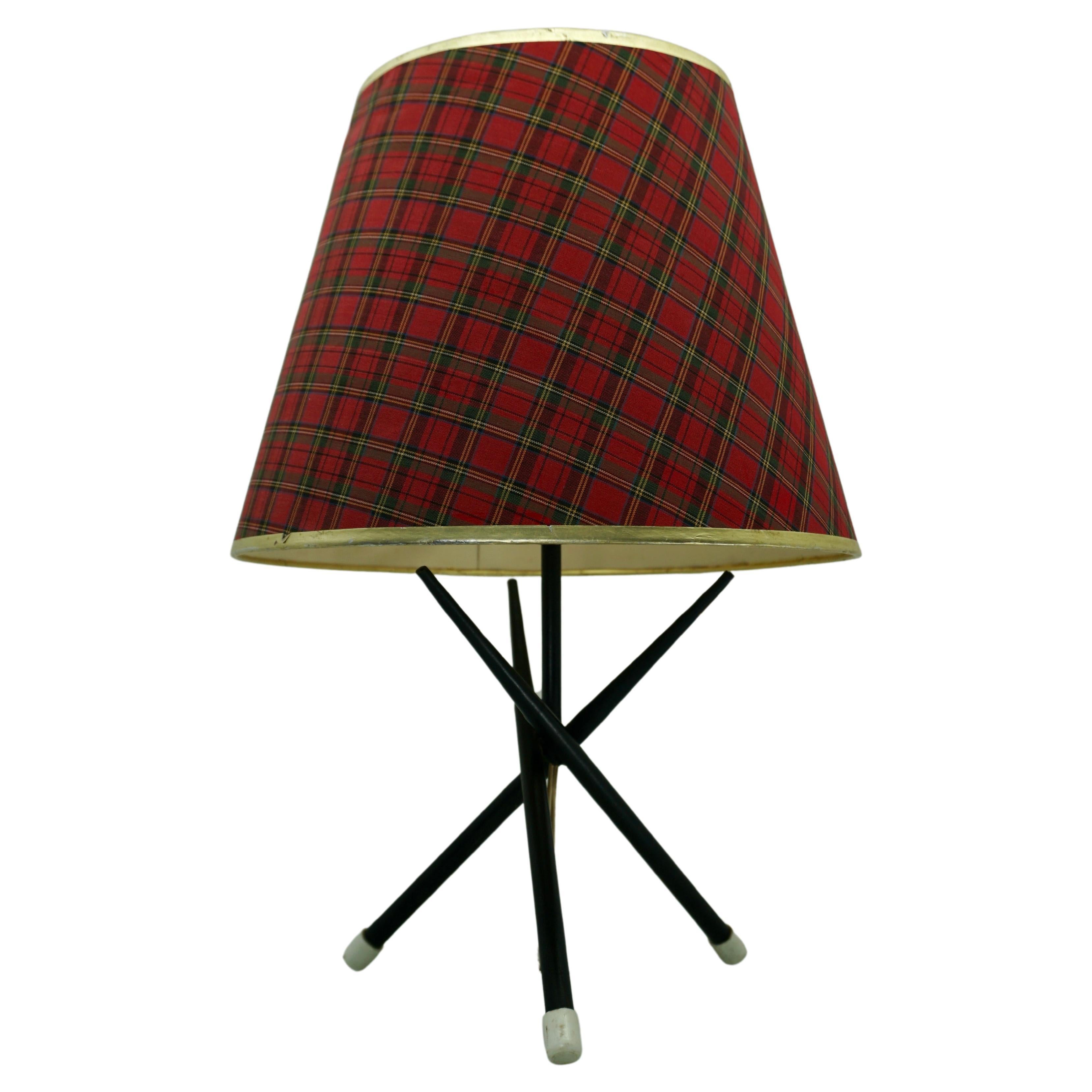 Rare 1950s tripod Louis Kalff table lamp.
