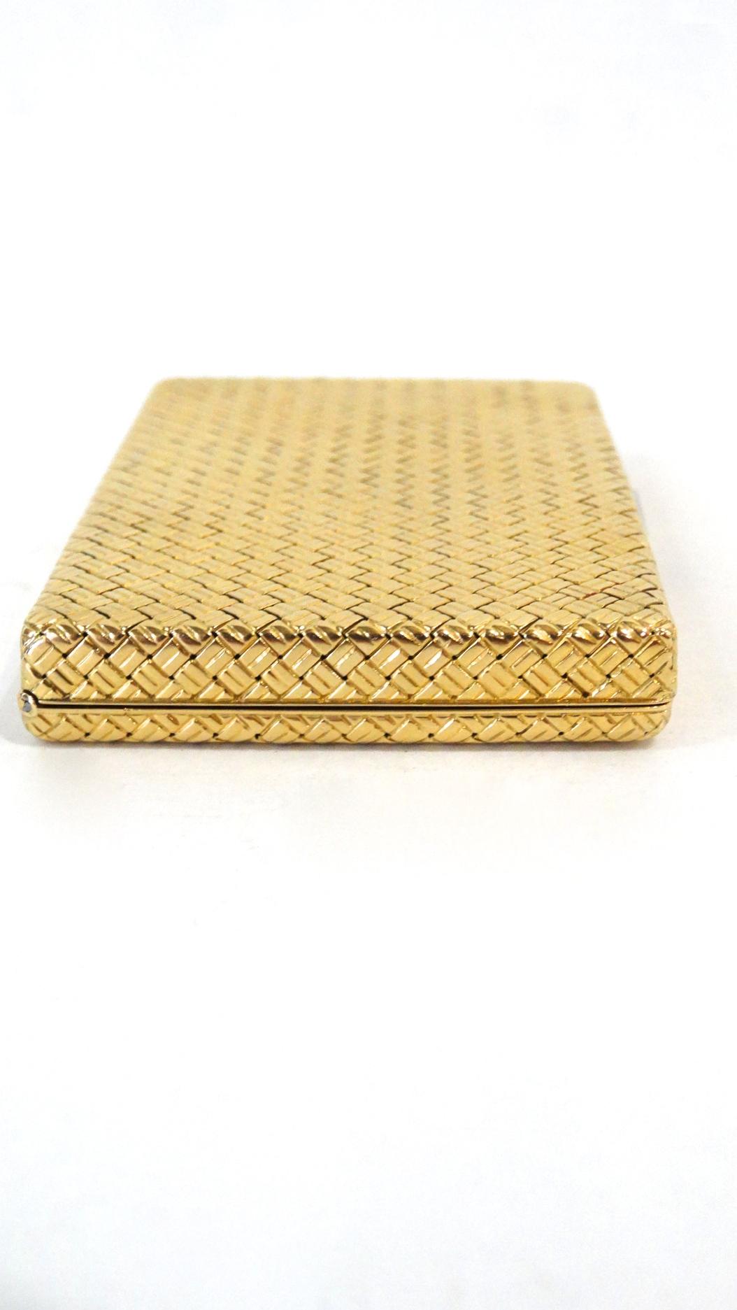 Rare and beautiful 1950s -60s  Van Cleef & Arpels 18K 750 Gold case. Features a woven basket pattern with  White Diamonds encrusted clasp. Total weight 136 grams  Interior features a mirror with a small crack inside... compartment with lid closure.