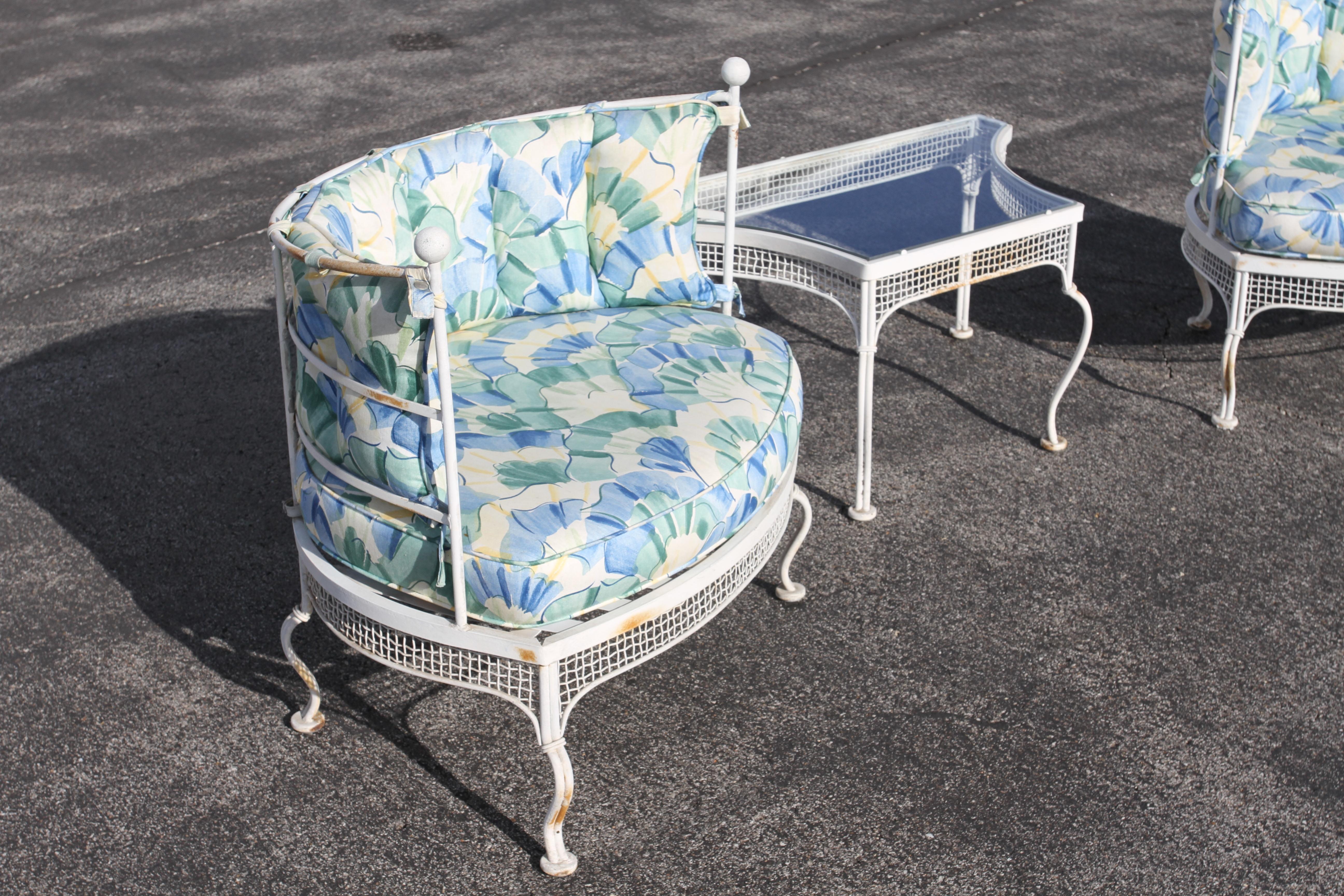 Classic and Rare 1950s midcentury Palm Beach Style outdoor wrought iron and mesh patio / garden tub or lounge chairs and table set by Woodard Furniture Co. Part of a original set I'm offering for sale, see the matching end tables, coffee table,