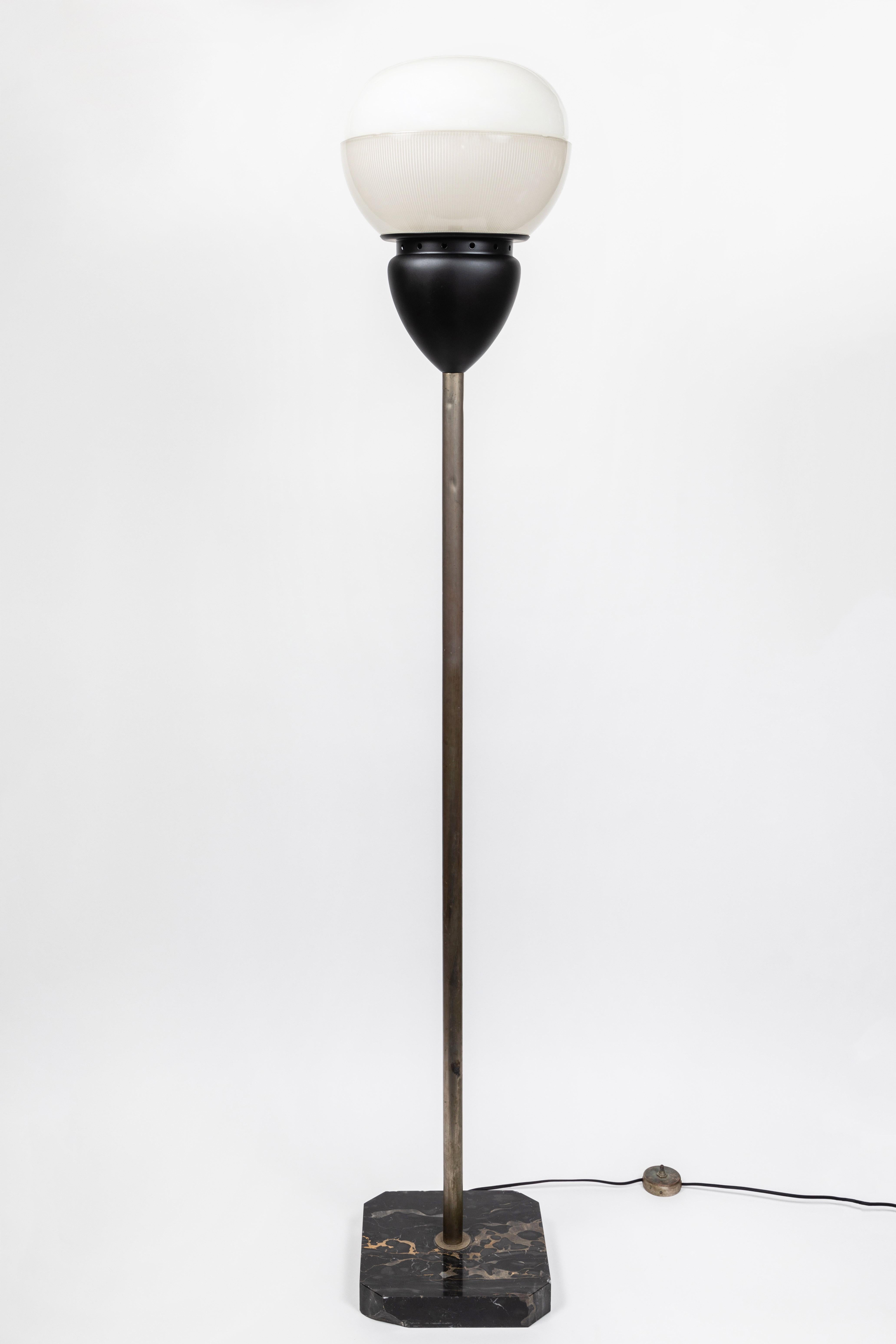 Monumental 1960 Sergio Mazza floor lamp for Artemide. Executed in black marble, nickel-plated brass, painted aluminum, pressed glass, and opaline glass. A quintessentially Italian and definitive early period Artemide design by the iconic Mazza.