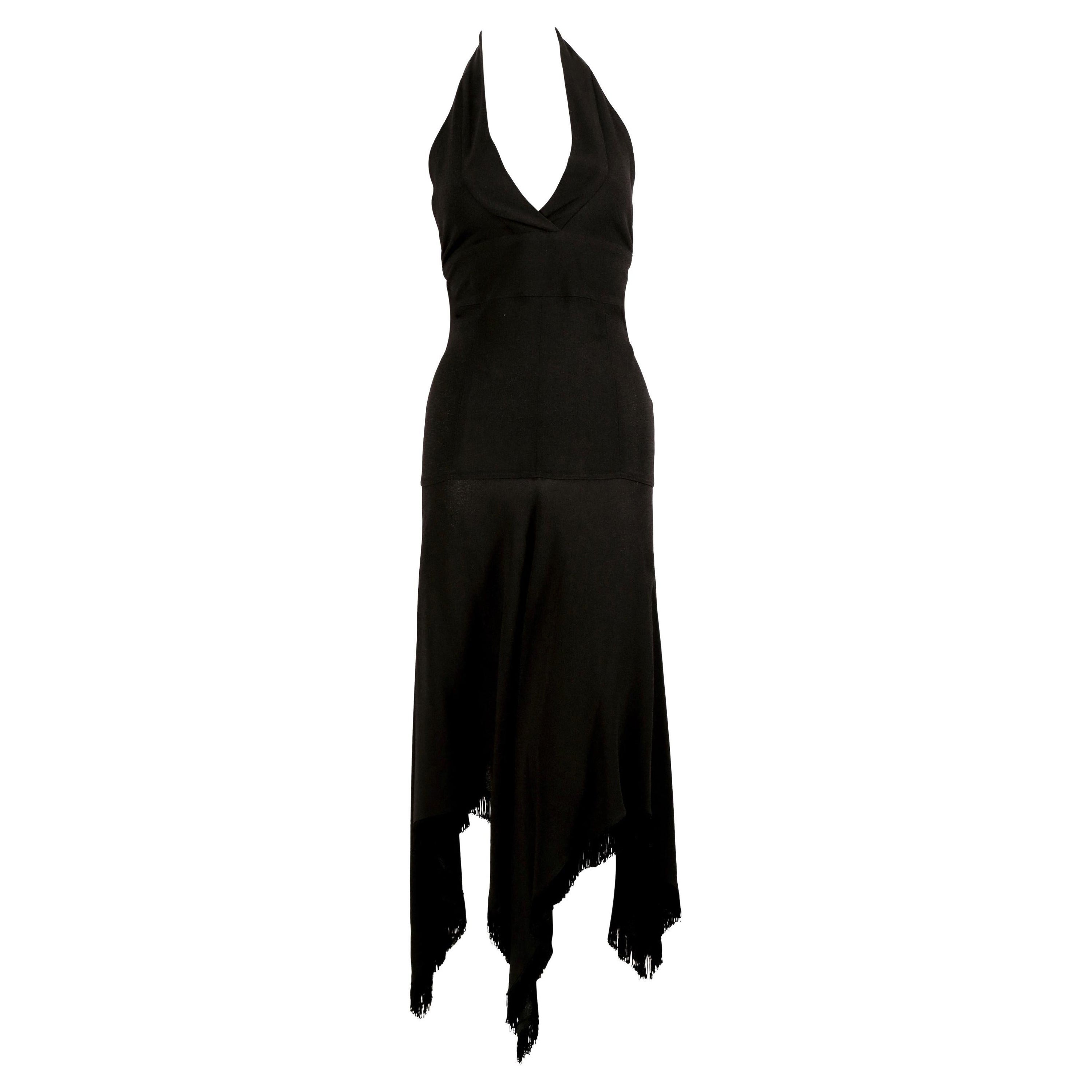 Very rare black moss crepe halter gown with handkerchief hemline and fringed trim from Alice Pollock from her Quorum boutique dating to late 1960's. Alice established her Quorum boutique in 1964 and began her collaboration with Ossie Clark and Celia