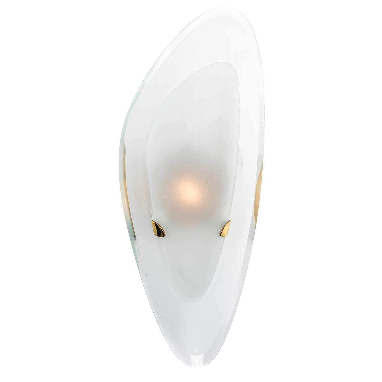 This is an elegant set of wall lights from the designer Max Ingrand consists of two beveled frosty glass glass plates, one larger than the other.