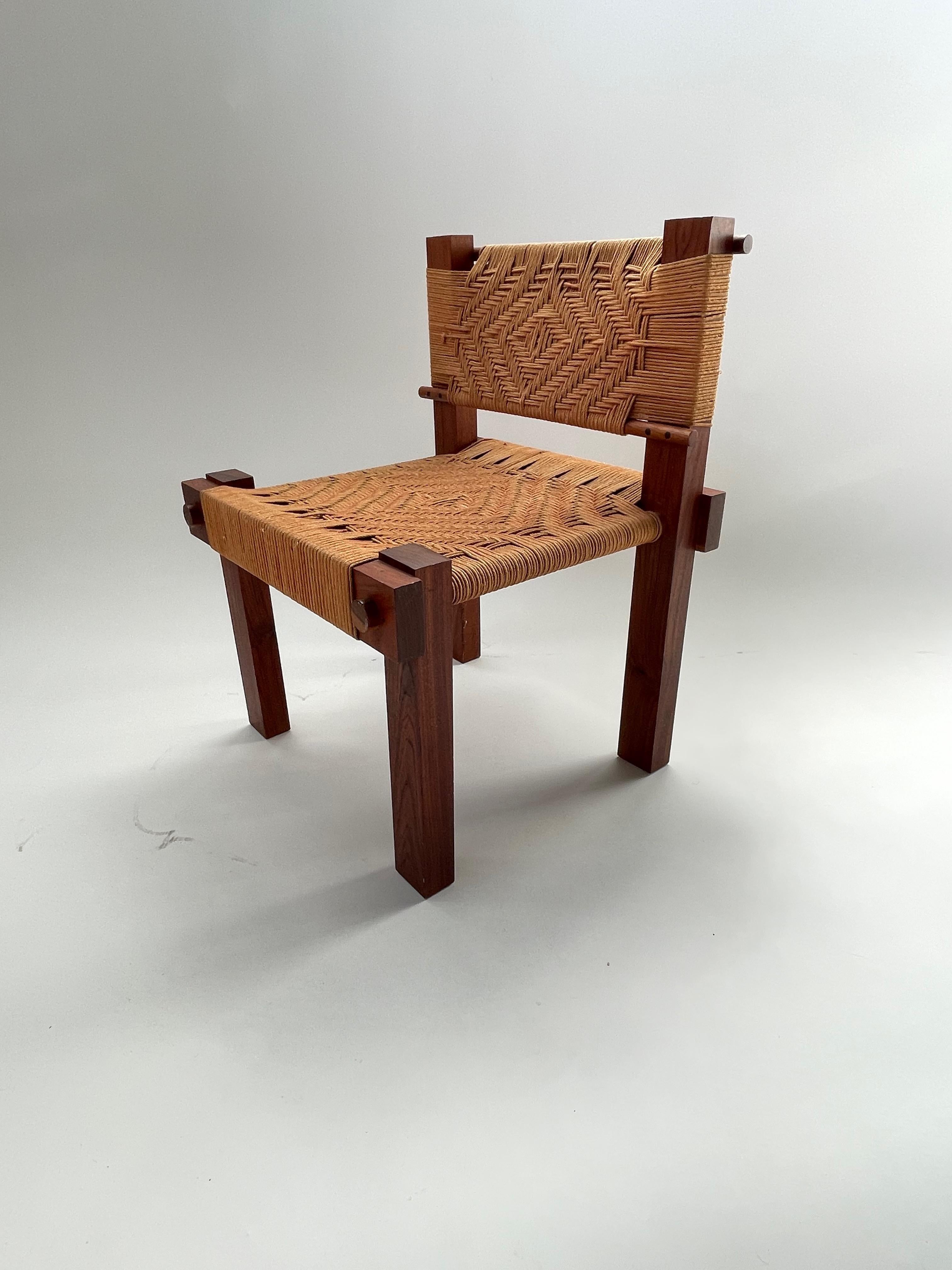 Very rare teak & woven rope occasional chair by Mini Boga for Taaru, India, c.1960s

The boxy frames of these chairs are made from solid teak wood, and the joints and details show a real quality of craftsmanship. the seats boast the original hand-