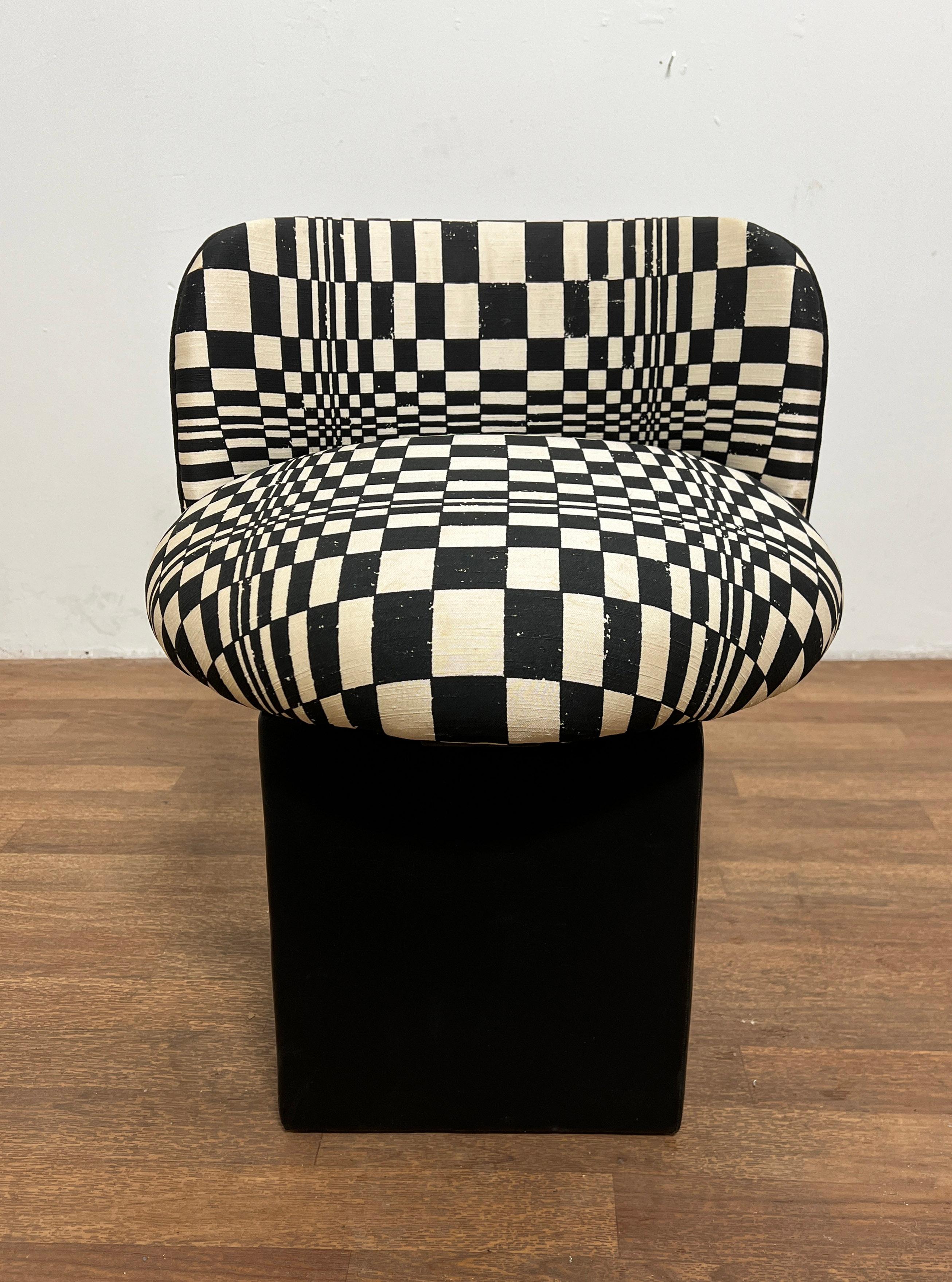 Stylish swivel vanity stool with original op art pvc oil cloth fabric. Base covered in original black vinyl.