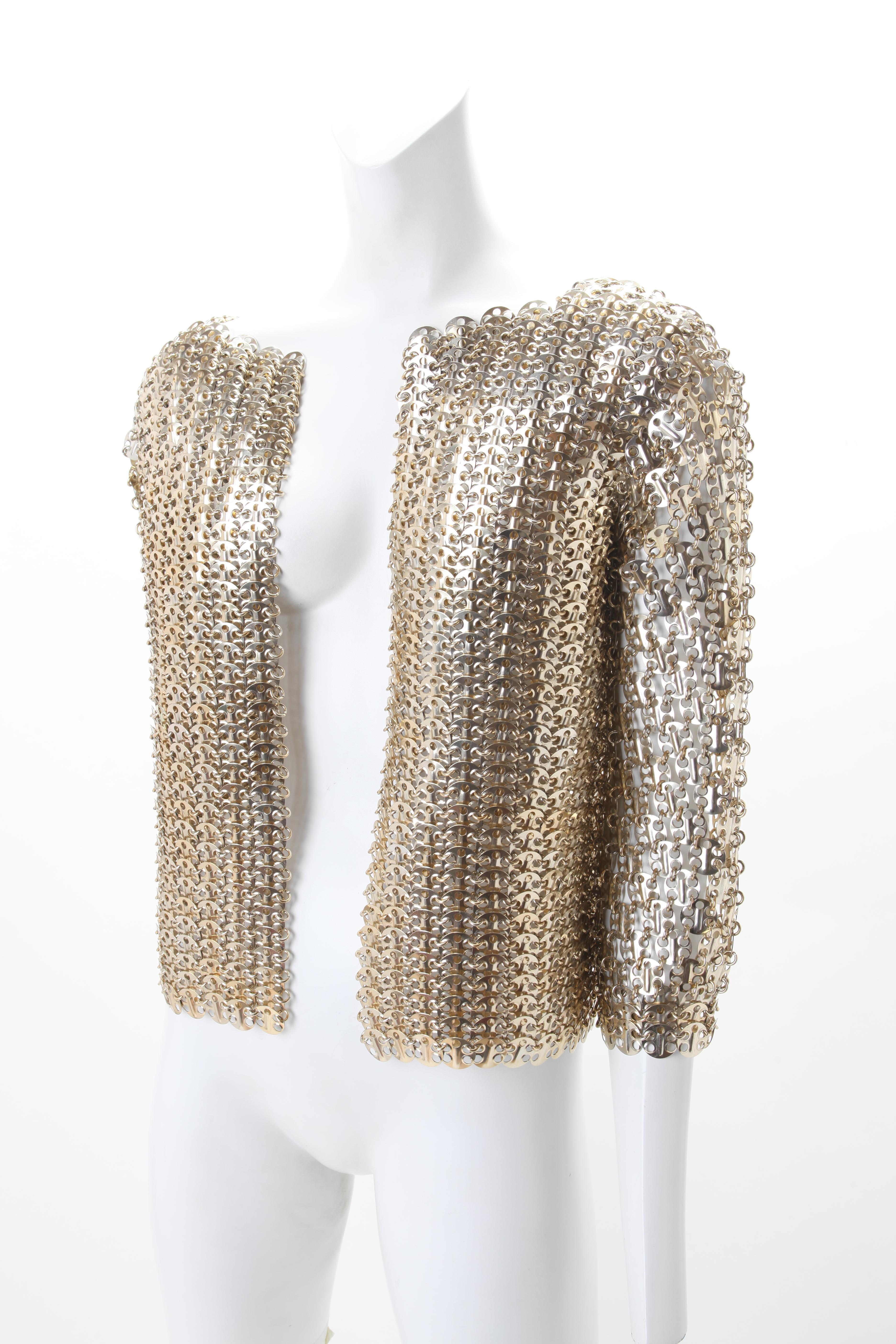 Rare 1960s Paco Rabbane Chainmail Jacket; Comprised of gold-tone linked metal discs. Open front with no closure.