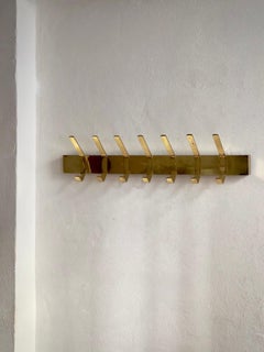 Rare 1960s Robust mid century finnish design coat rack in patinated brass.