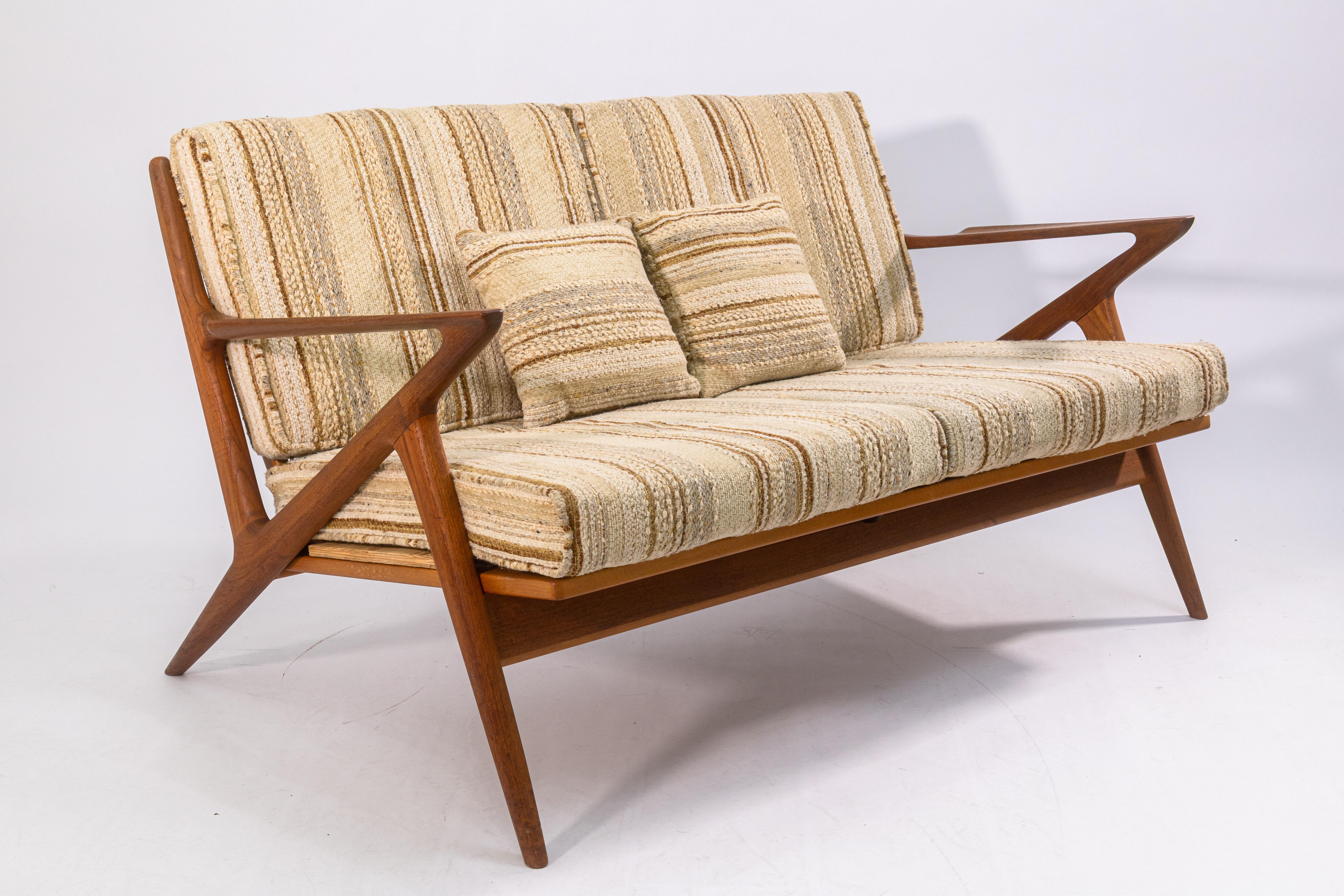 A vintage 1960s Poul Jensen for Selig Z settee. This lovely mid-century modern sofa is a rare iteration of Poul Jensen's Z settee for Selig. The Z design is an iconic danish design of the mid-century era. The shape is clean, simple, and sharp;