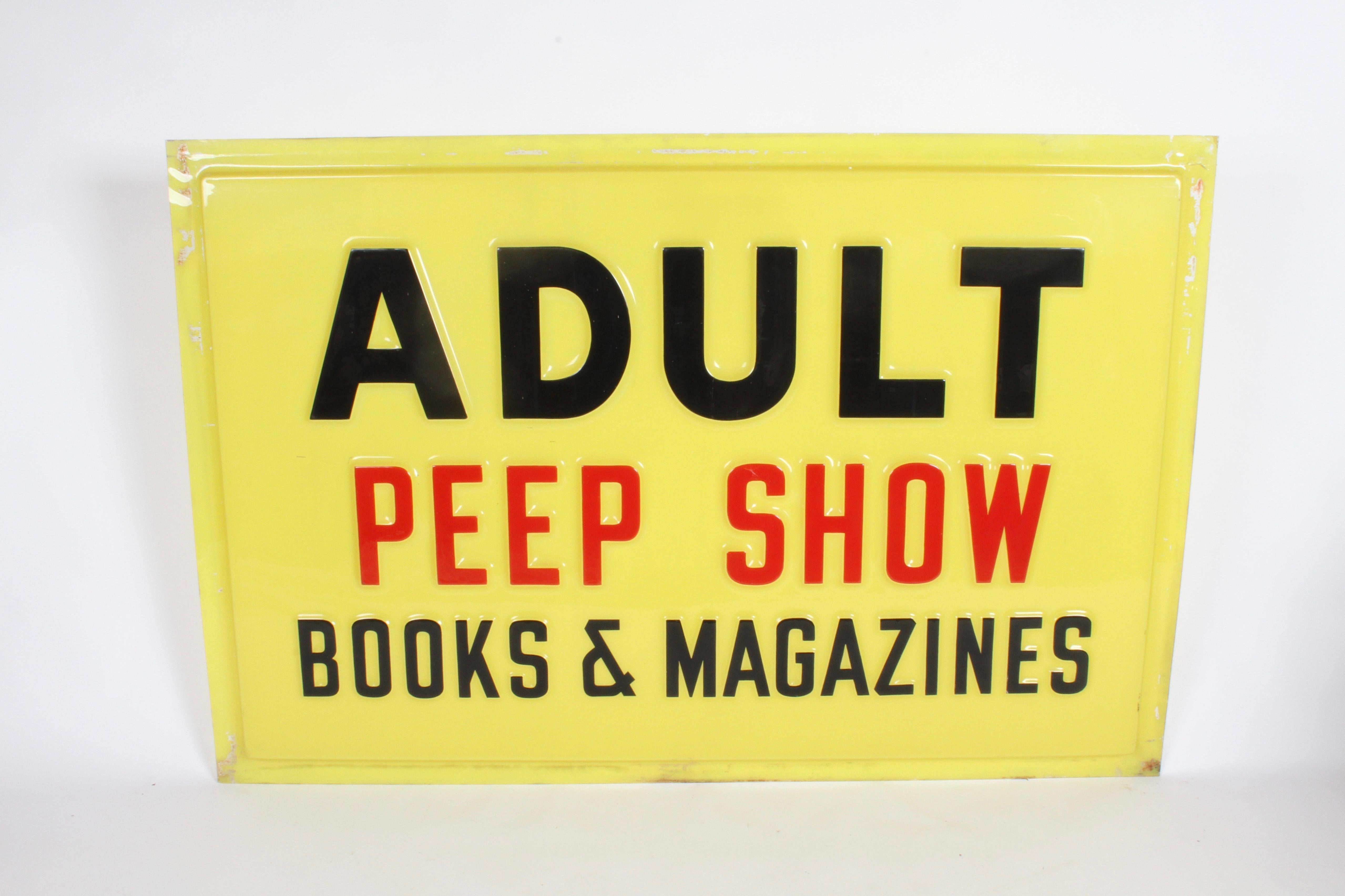 Large 1970s sign with embossed letters, Adult Peep Show - Books & Magazines. Sold without its original aluminum frame, can be back lit with LED. Small star crack to top of Red 