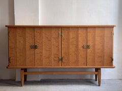 1970s Danish Sideboard in oak and brass brackets design by Henning Kjærnulf