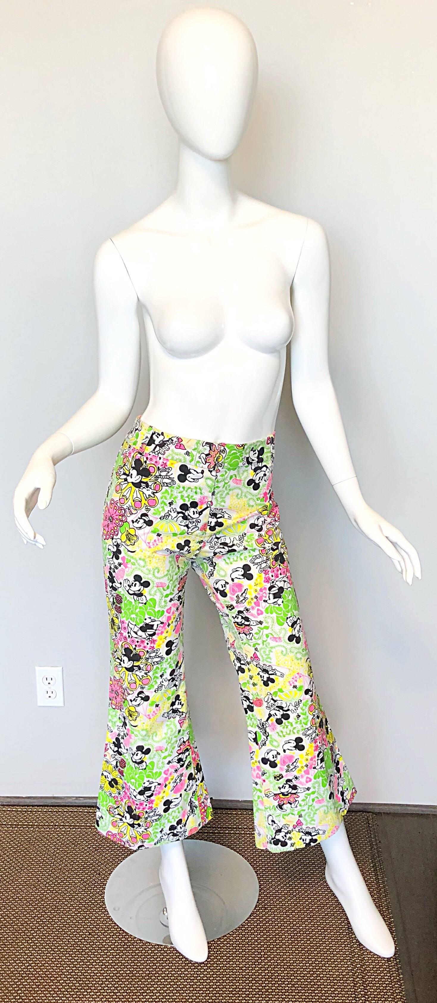 Rare musuem quality 70s LILLY PULITZER 'THE LILLY'
Mickey and Minnie Mouse / Disney high waisted unisex cotton bell bottom pants! A pair of shorts in the same print recently sold online for over $16,000! Wonderful form fitting silhouette with a
