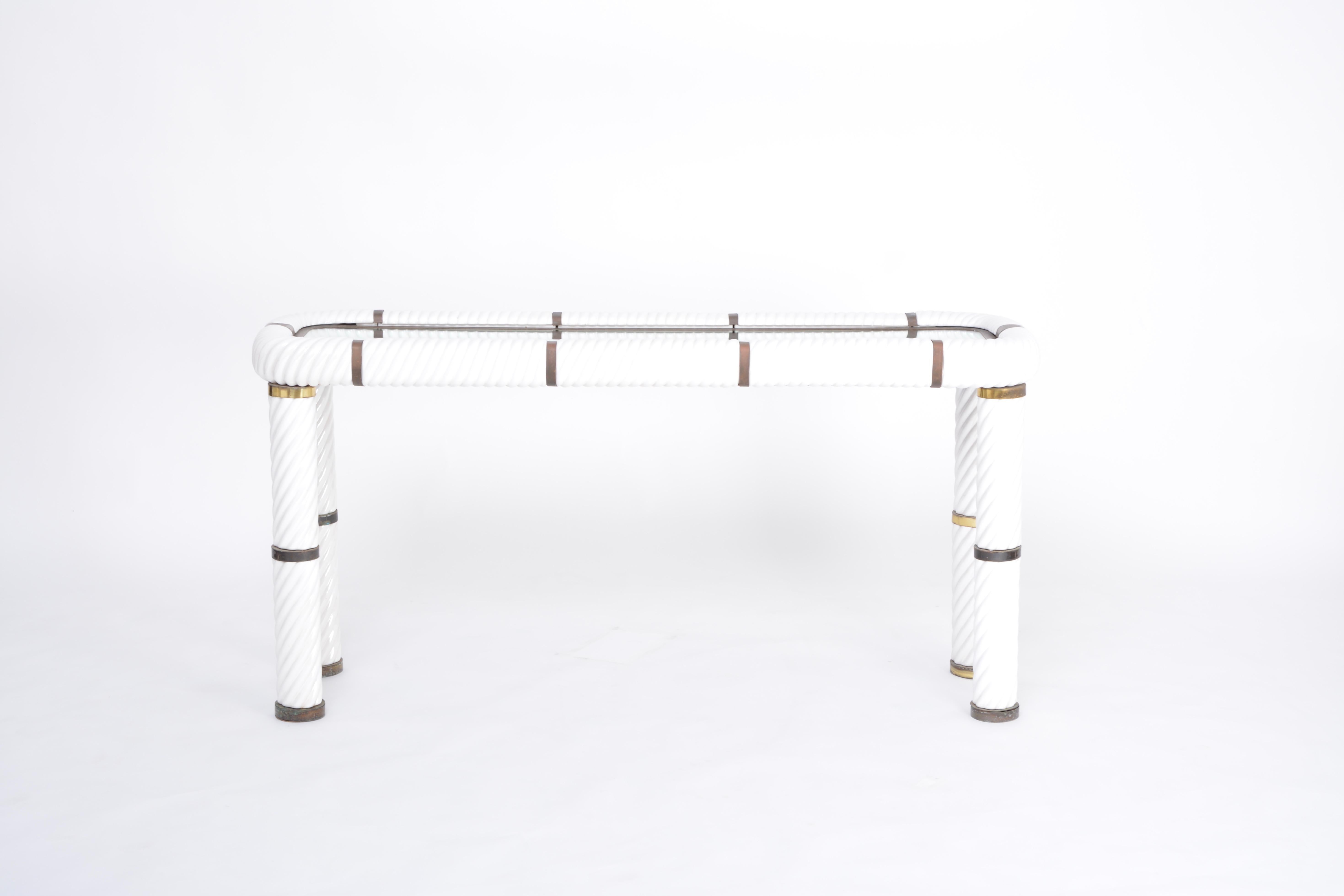 Rare 1970s Tommaso barbi white ceramic and brass console table 
Stunning console table designed by Tommaso Barby. This table features one of Barbi's signature techniques, which is porcelain in a spiral form to give this table it's absolute stunning