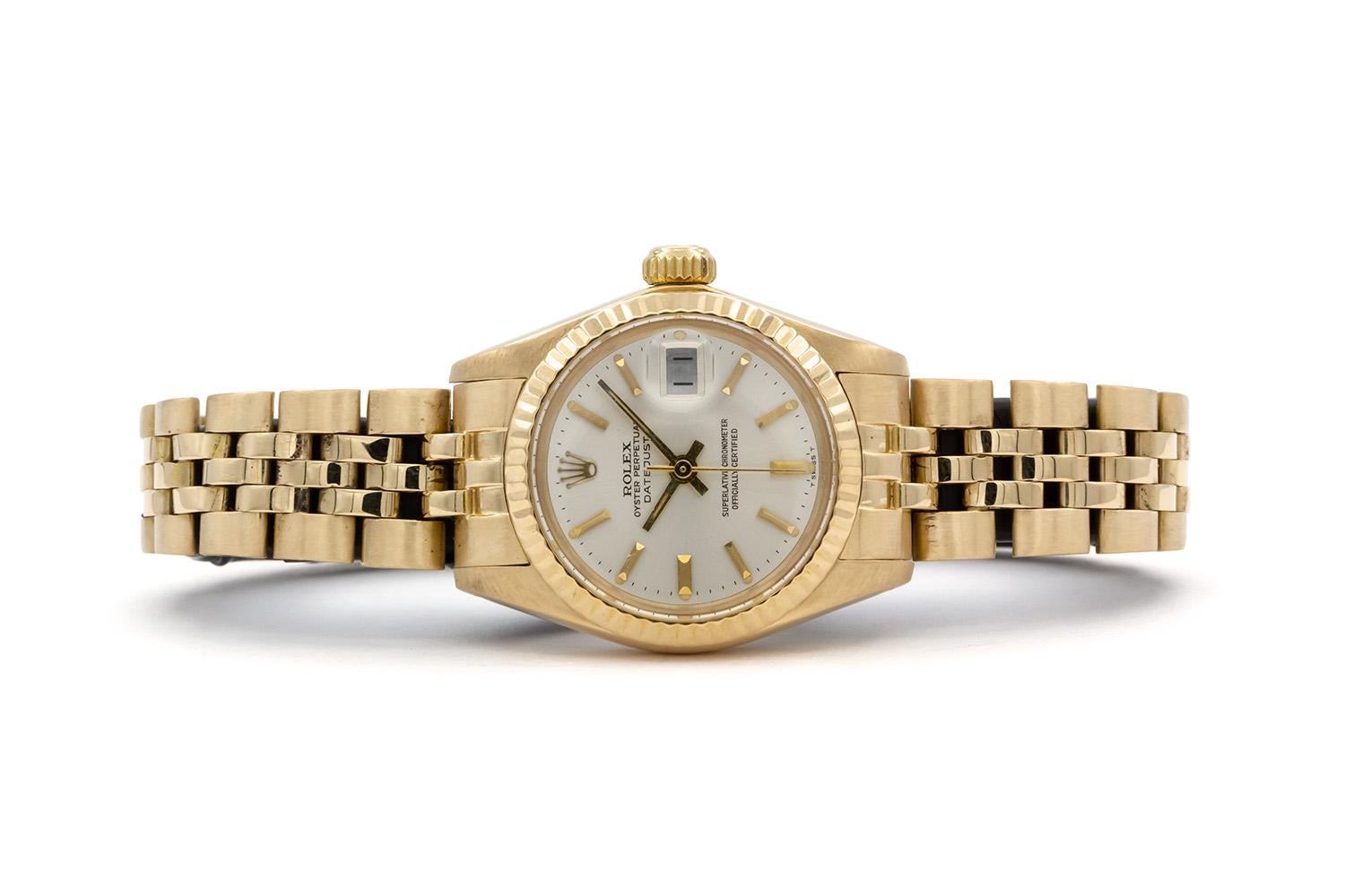 We arepleased to offer this Rare 1979 Rolex Ladies Datejust Solid 18k Yellow Gold 6917. This classic ladies watch features a solid 18k Yellow gold design and timeless look. A vintage ladies Rolex in this condition is hard to find these days. It will