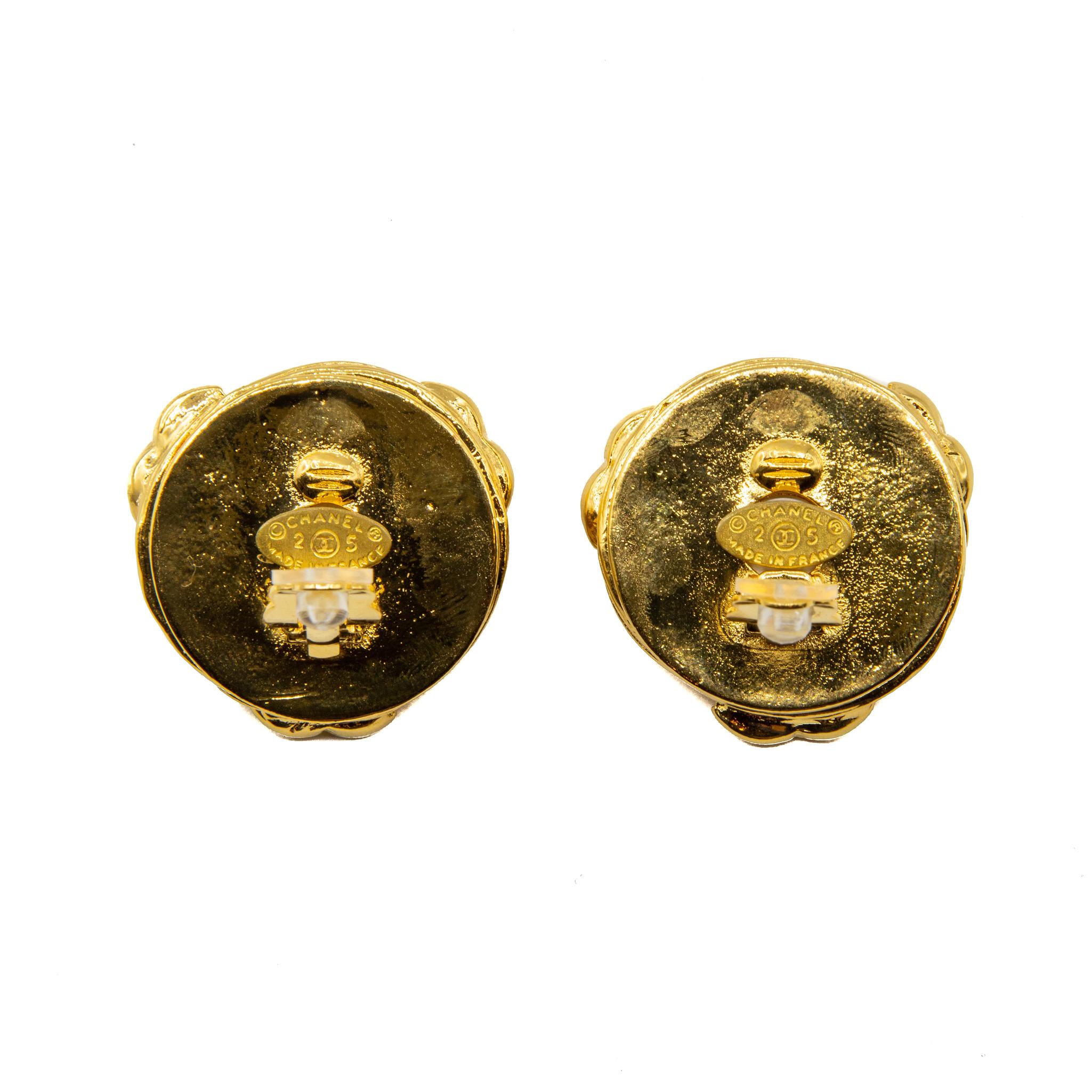 Rare 1980s collection 25 Chanel heavyweight baroque-inspired faux pearl and gilt clip-on earrings, featuring a swirl design with three large complementing house logos. This item carries the Chanel authenticity plaque. Provenience France. 