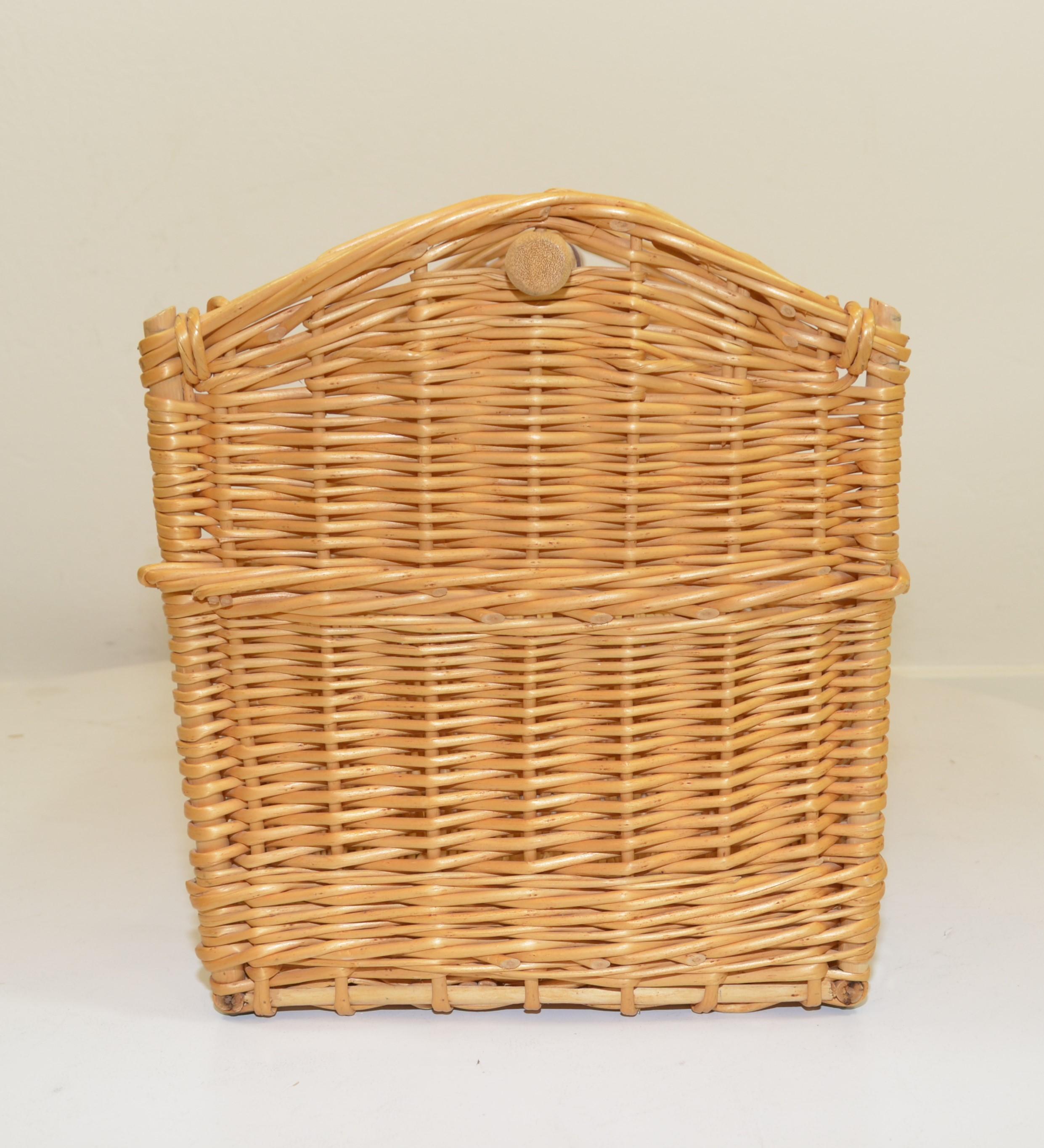 1980's wicker basket by Hermes featuring leather trimming and top handle with gold-tone stamped grommets. Originally a Grooming Box but would make a lovely gathering or picnic basket. Excellent unused vintage condition with no major flaws or visible