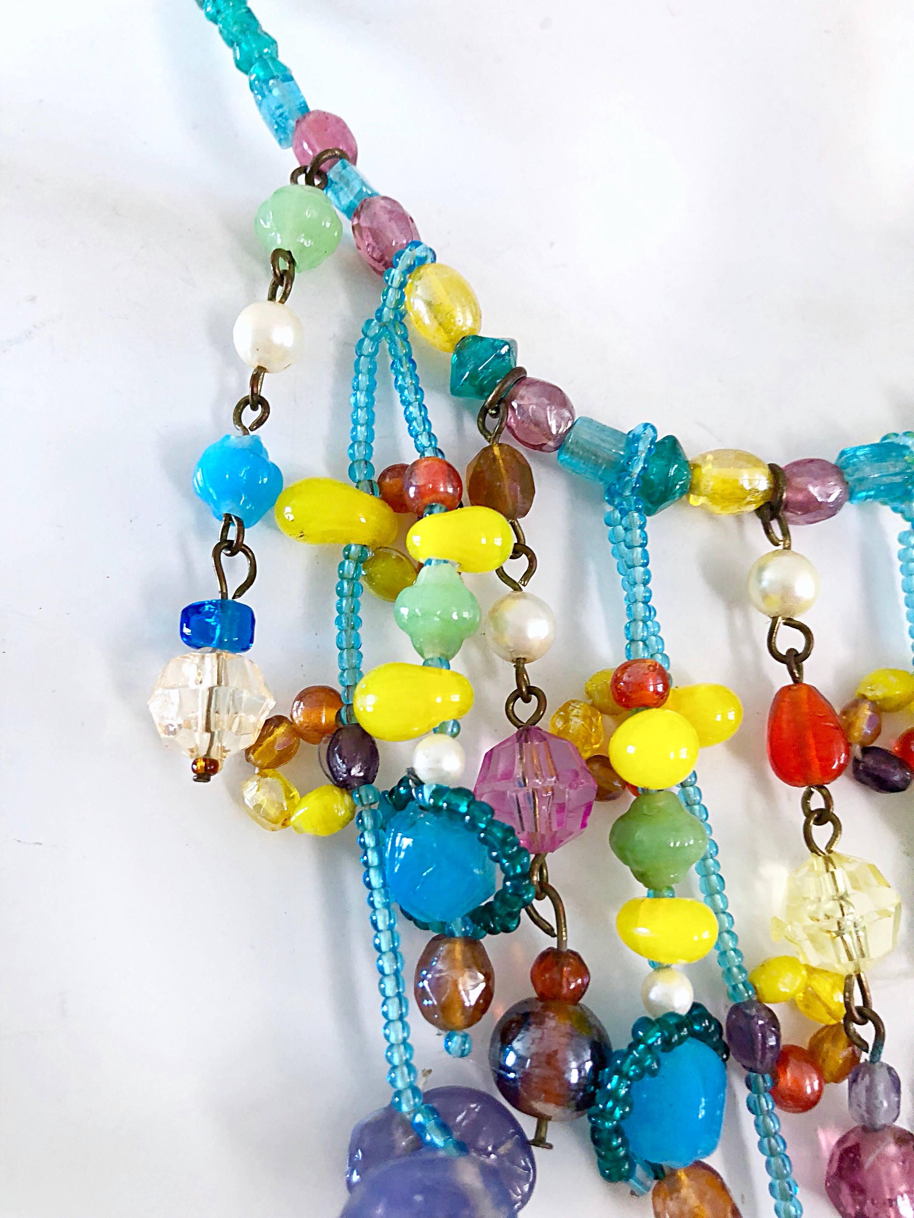 Rare early 80s MARC LABAT muto colored fruit salad style necklace choker. Features blue, yellow, purple, blue, turquoise, red and orange beads, stones and pearls throughout. Adjustable length can be worn multiple lengths