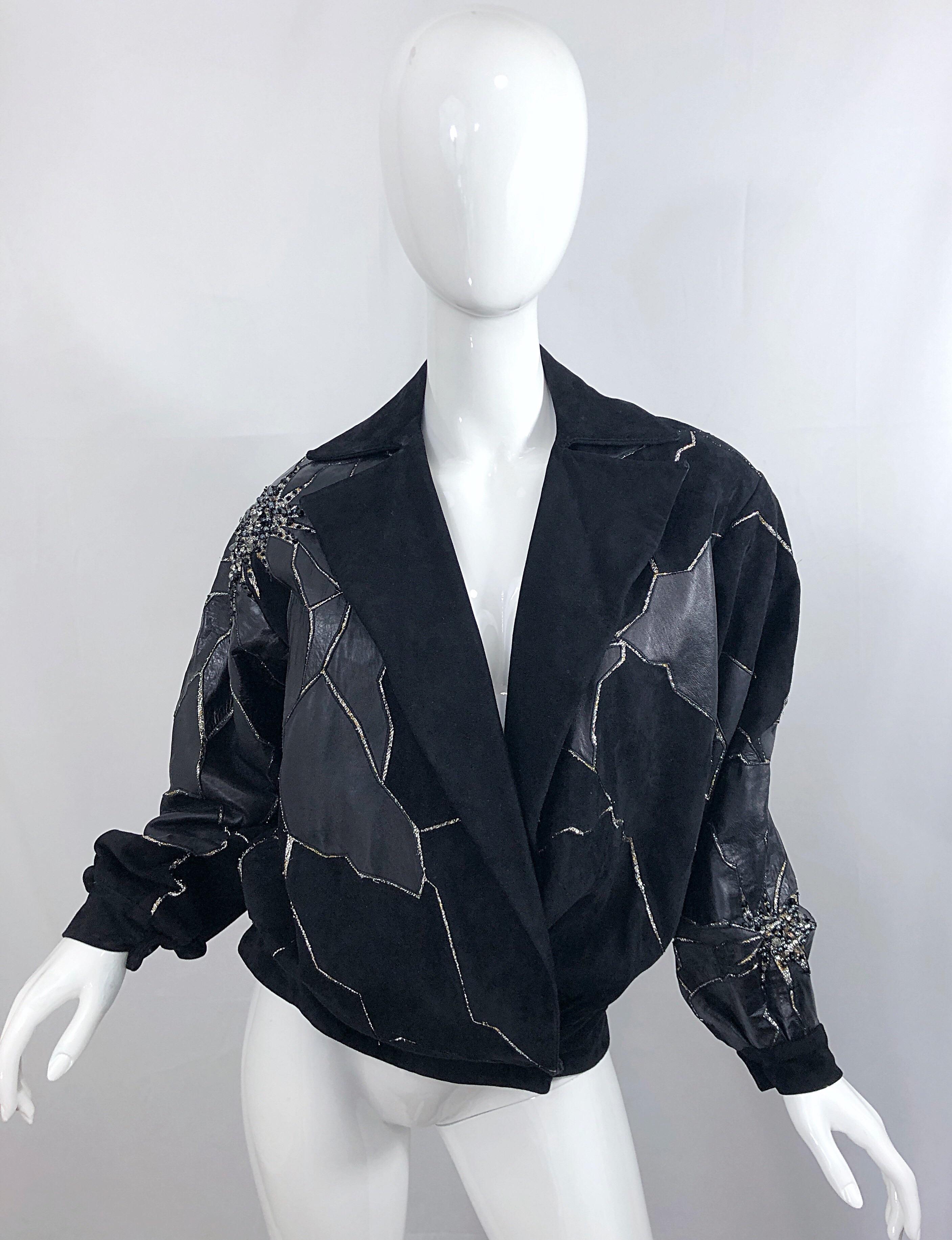 Rare vintage 80s PAUL LOUIS ORRIER Couture black and silver leather and suede rhinestone, sequin and beaded bomber jacket! Dolman sleeves will accomodate an array of bust sizes. Features patches of soft leather and suede, with silver silk tinsel