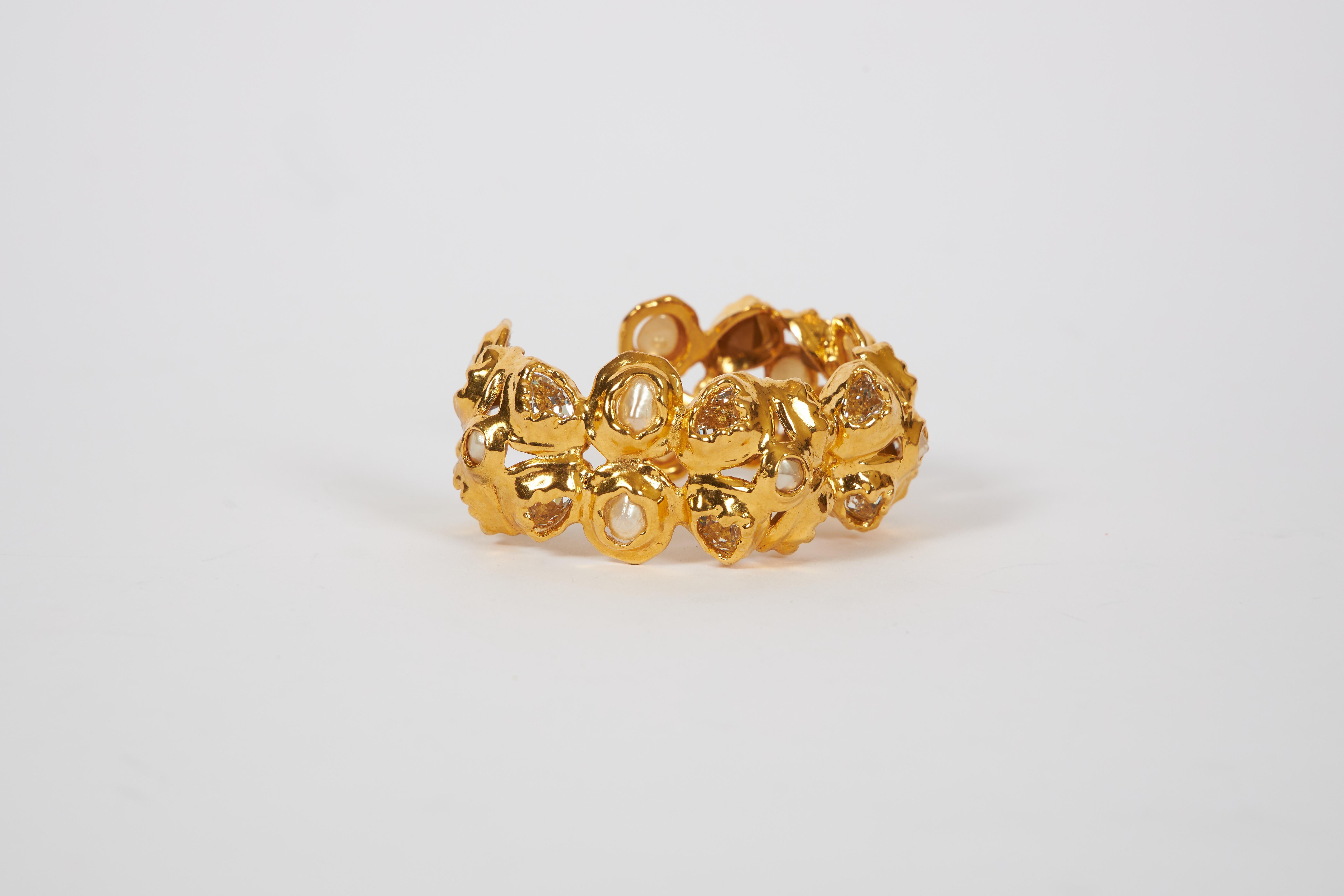Chanel textured gold tone metal cuff set with faux pearls. Collection 29. Cuff opening, 1.25