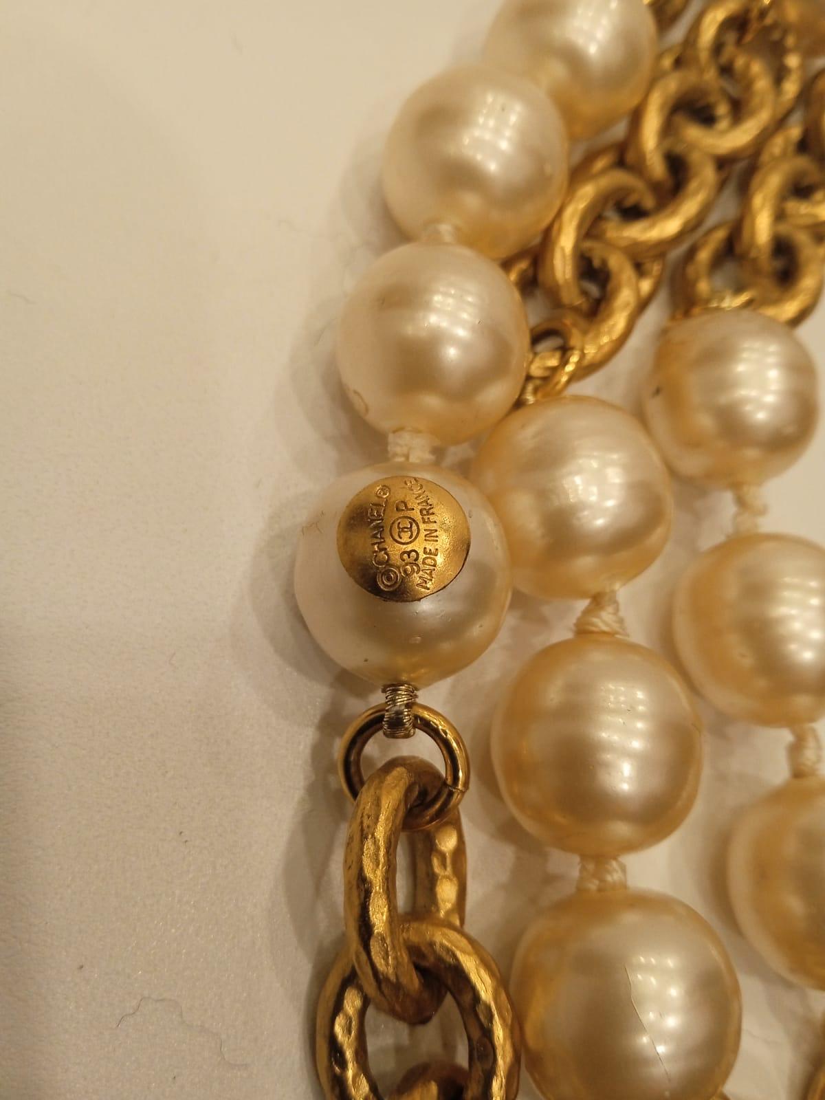 Vintage Chanel pearl chain belt in gold. Beautiful piece. Minor tarnishing on the hardware and minor chipping on some of the pearl details. Comes as is. Length is 90 cm.