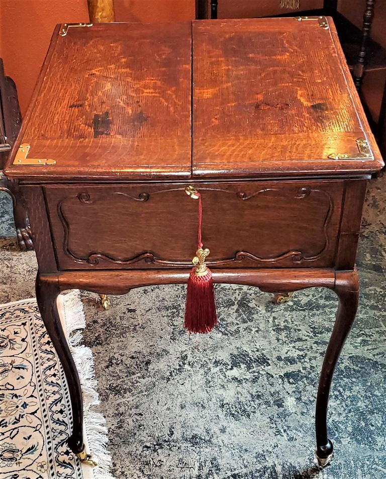 Presenting an exceptionally rare 19th century English eclipse patented telescopic desk.

Made of oak in the Rococo style in Great Britain, circa 1880.

Fully marked as “The Eclipse” … Brand’s Patent No 27871 … Patented in Great Britain.

Marked on