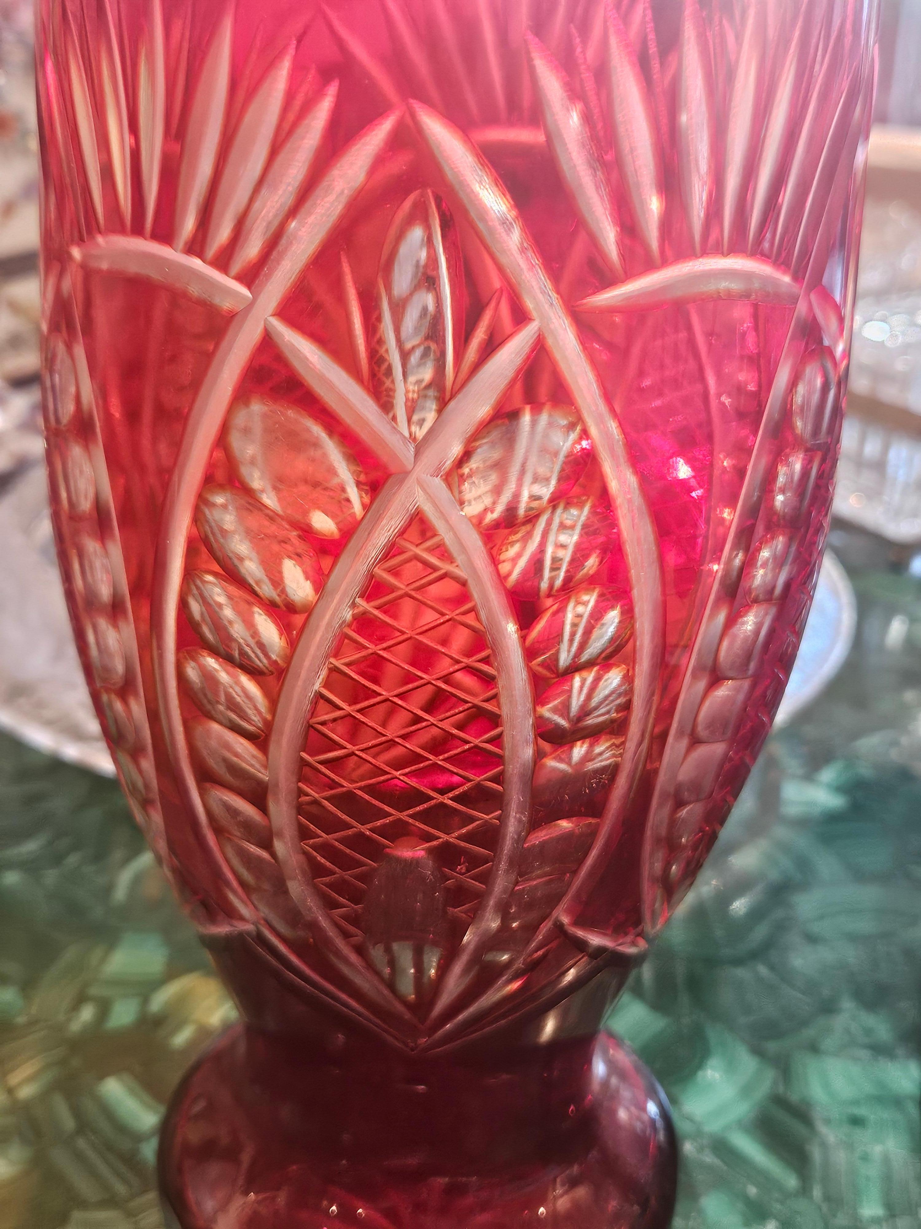 The Following Item we are offering is a Rare Antique Lovely HEAVY HANDCUT Red Ruby Hand Crystal Glass Vase. Vase is Finely Detailed Throughout in a Magnificent Pattern Surrounded Throughout.  
An Outstanding Piece!! Taken from a Several Million