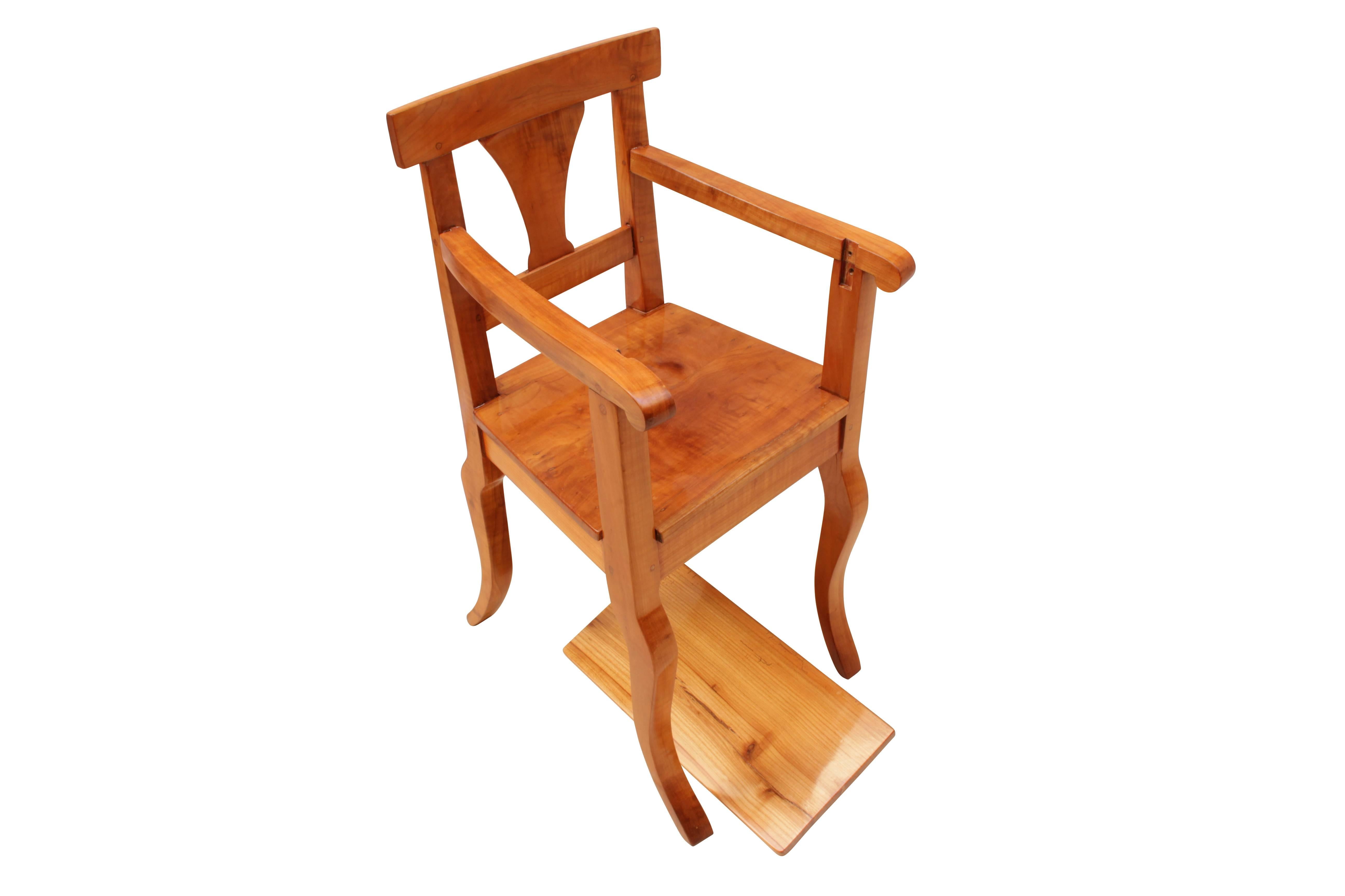 A small high chair from the time of Biedermeier, circa 1830. The chair is made of solid cherry. The small tray can easily be pulled upwards. An absolute rarity. In very good restored condition.
Measure: Seat height 42cm.