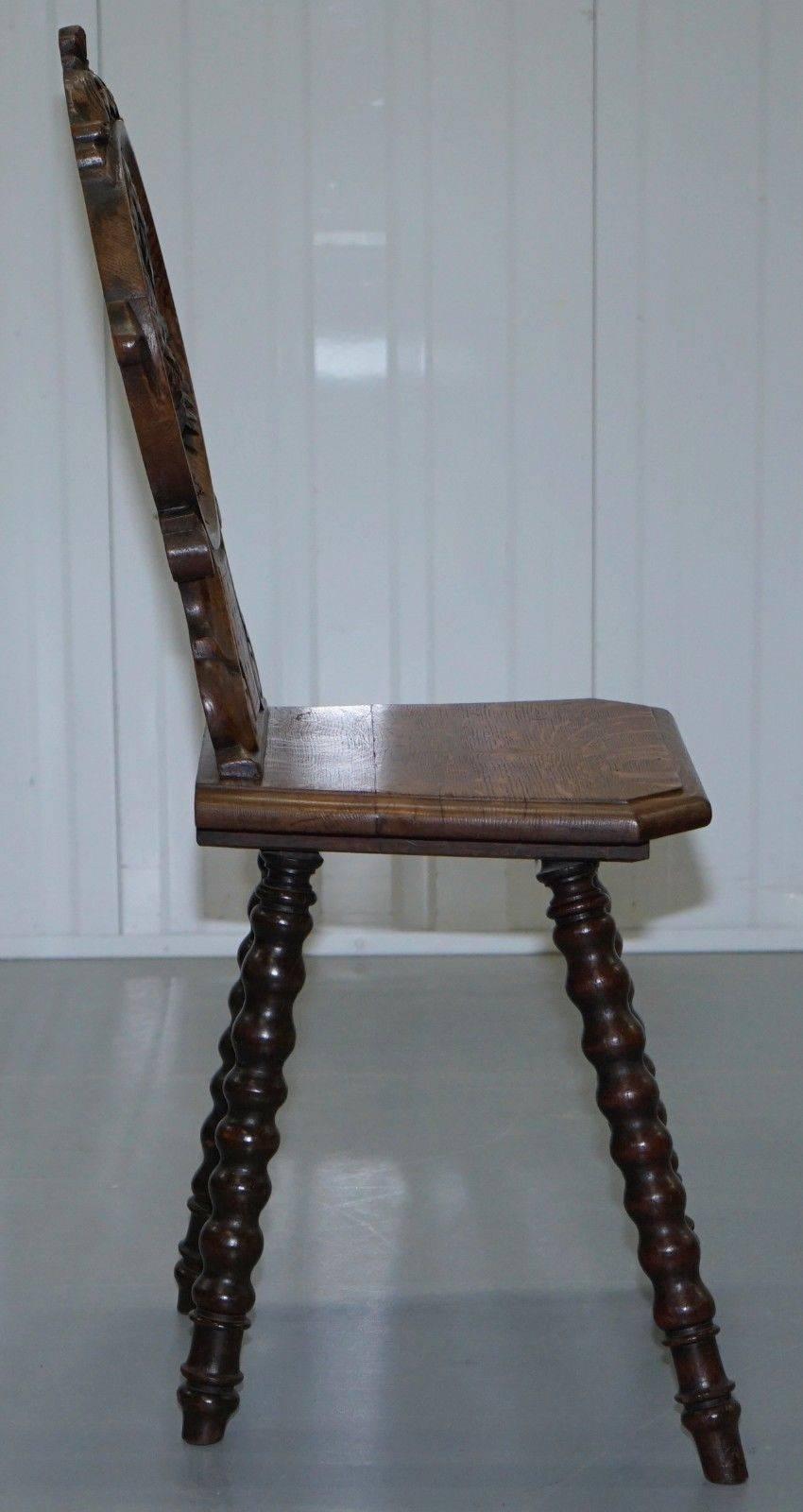 Hardwood Rare 19th Century Black Forrest Carved Hall Chair Hand-Carved Hawk Bobbin Turned For Sale