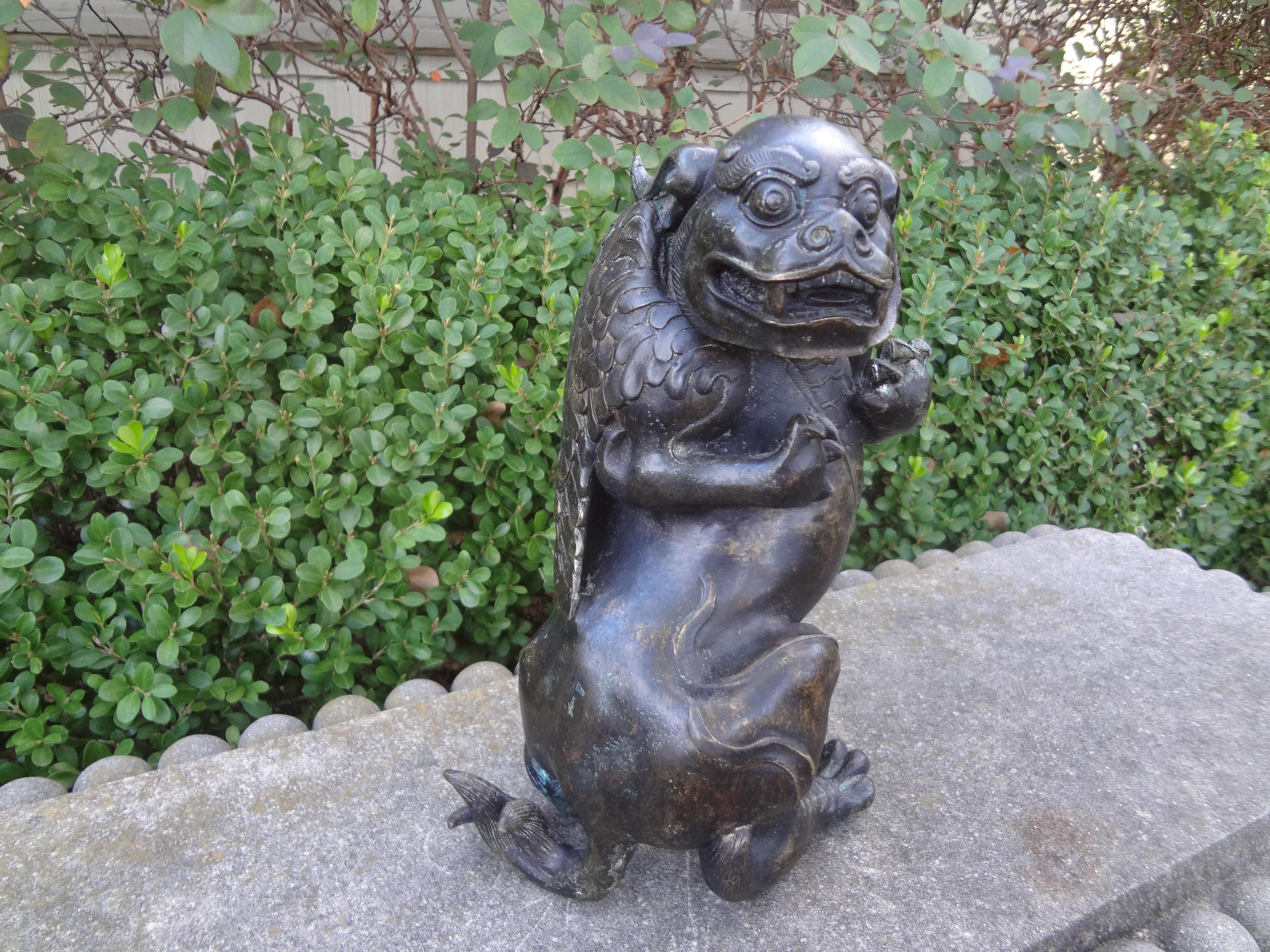 Qing Rare 19th Century Chinese Bronze Foo Dog With Wings For Sale