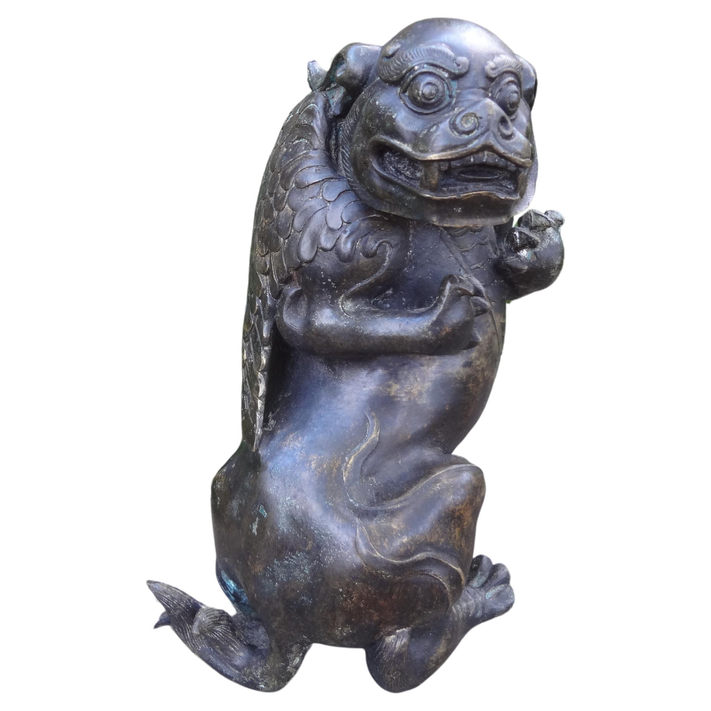 Rare 19th Century Chinese Bronze Foo Dog With Wings For Sale