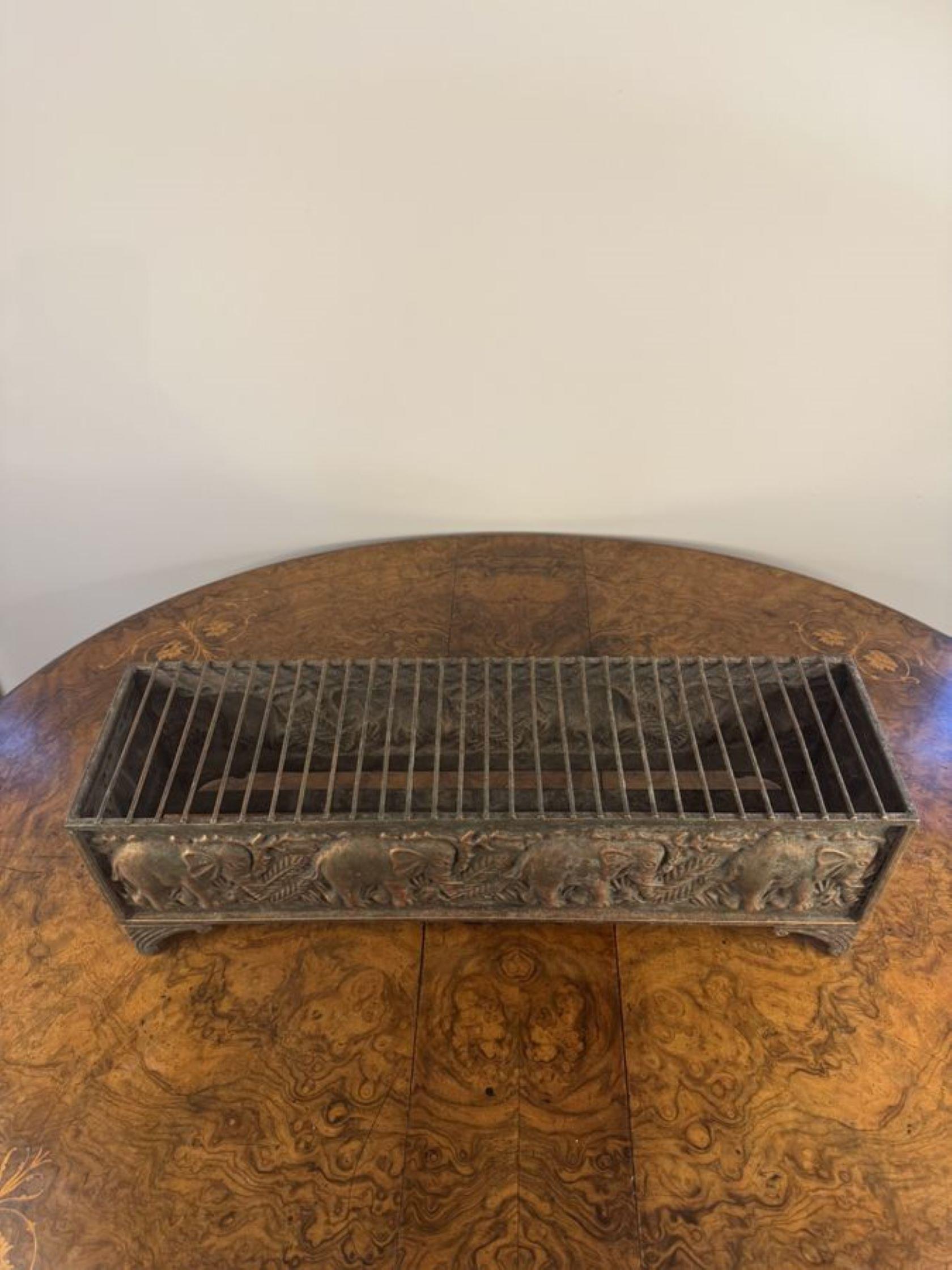 Rare 19th century copper warmer centre piece, having an unusual William IV copper centre piece warmer with a grid top, decorated with a band of stylised elephants to the frieze below, raised on four bracket scrolled feet. 

D. 1830