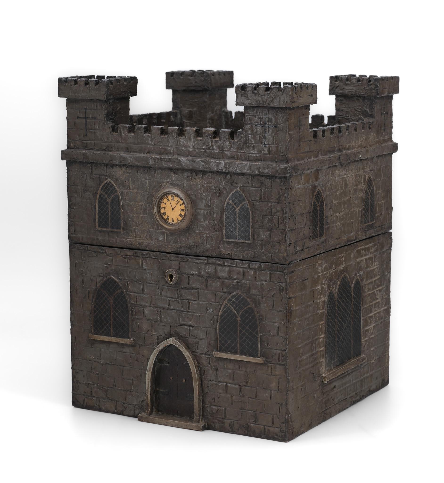 A rare and almost certainly unique 19th century castle decanter. Possibly Scottish. Circa 1870.

The outer is made from plaster of Paris, with detailed texture, having wooden hand-painted lancet arched windows and front door, and featuring a central