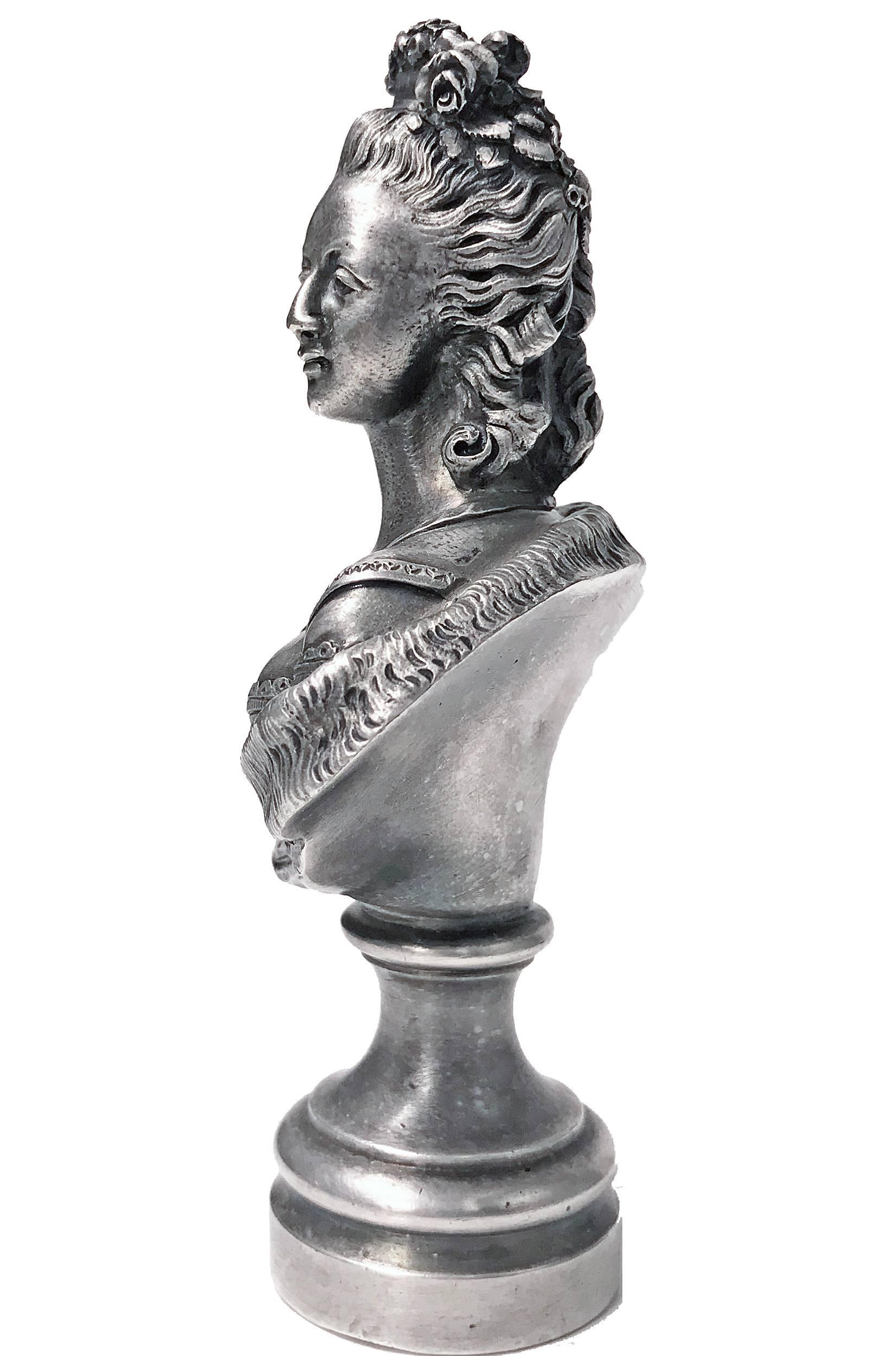 Rare late 19th century heavy silver on bronze desk seal, probably French, circa 1880. The seal very intricately depicting a bust of female profile in Marie Antoinette late 18th century style with upswept hair and draped gown. Unmarked, acid tested