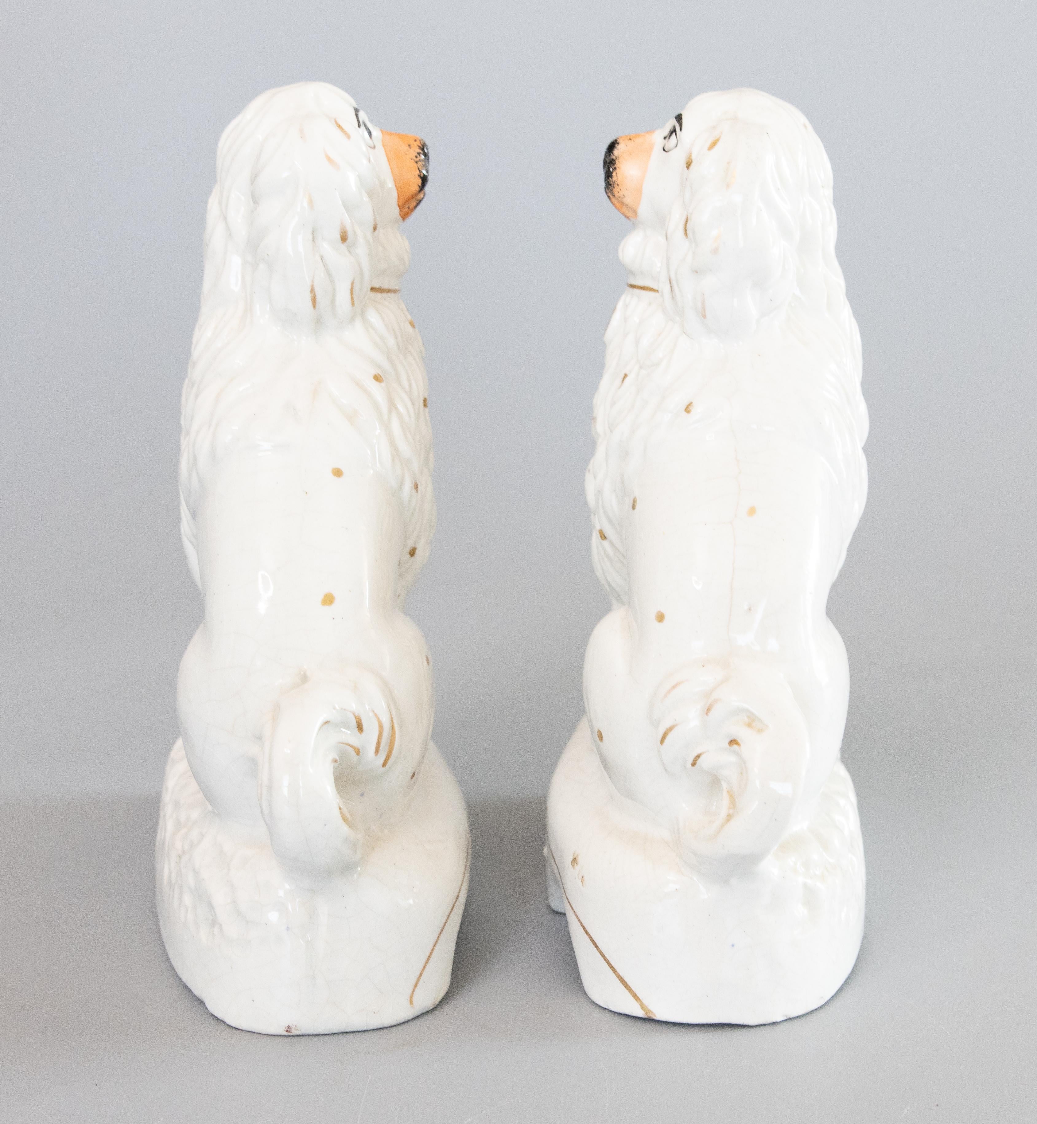 Fired Rare Pair of 19th Century English Staffordshire White Spaniel Dogs With Pups For Sale